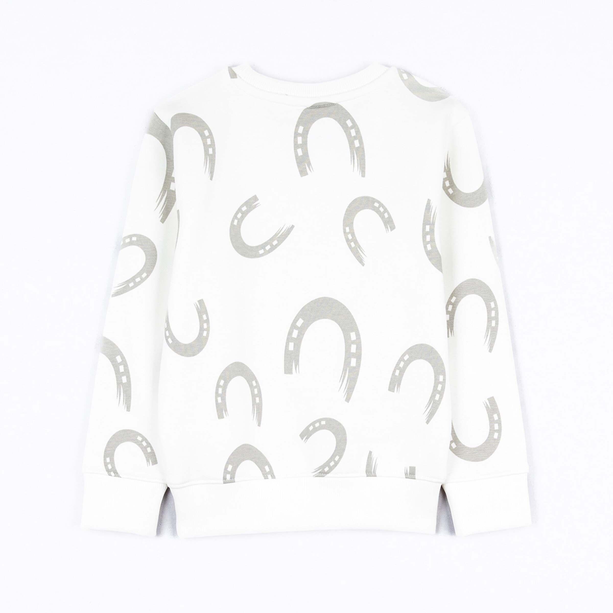 White sweatshirt with gray horseshoe pattern.