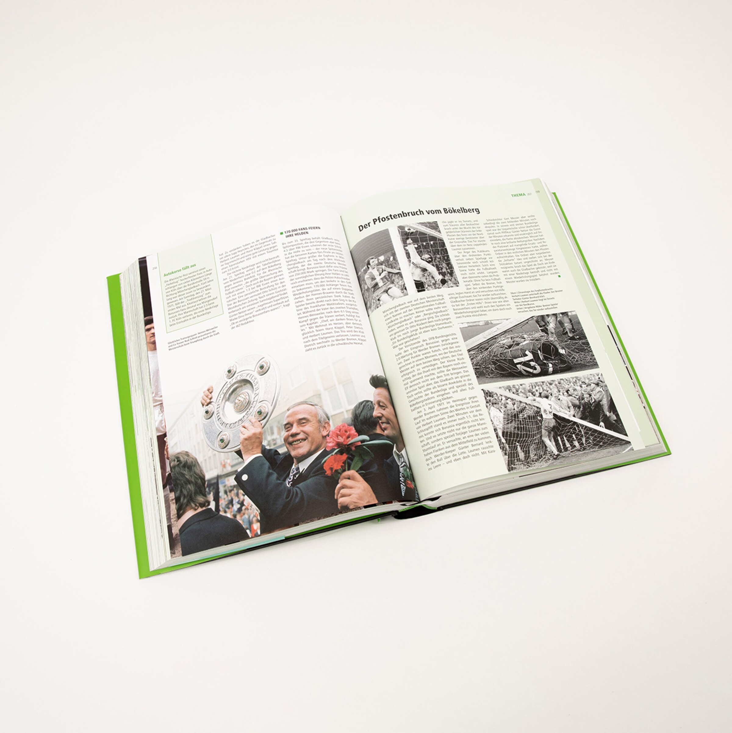 An open book featuring text about soccer celebrating a victory and displaying a trophy.