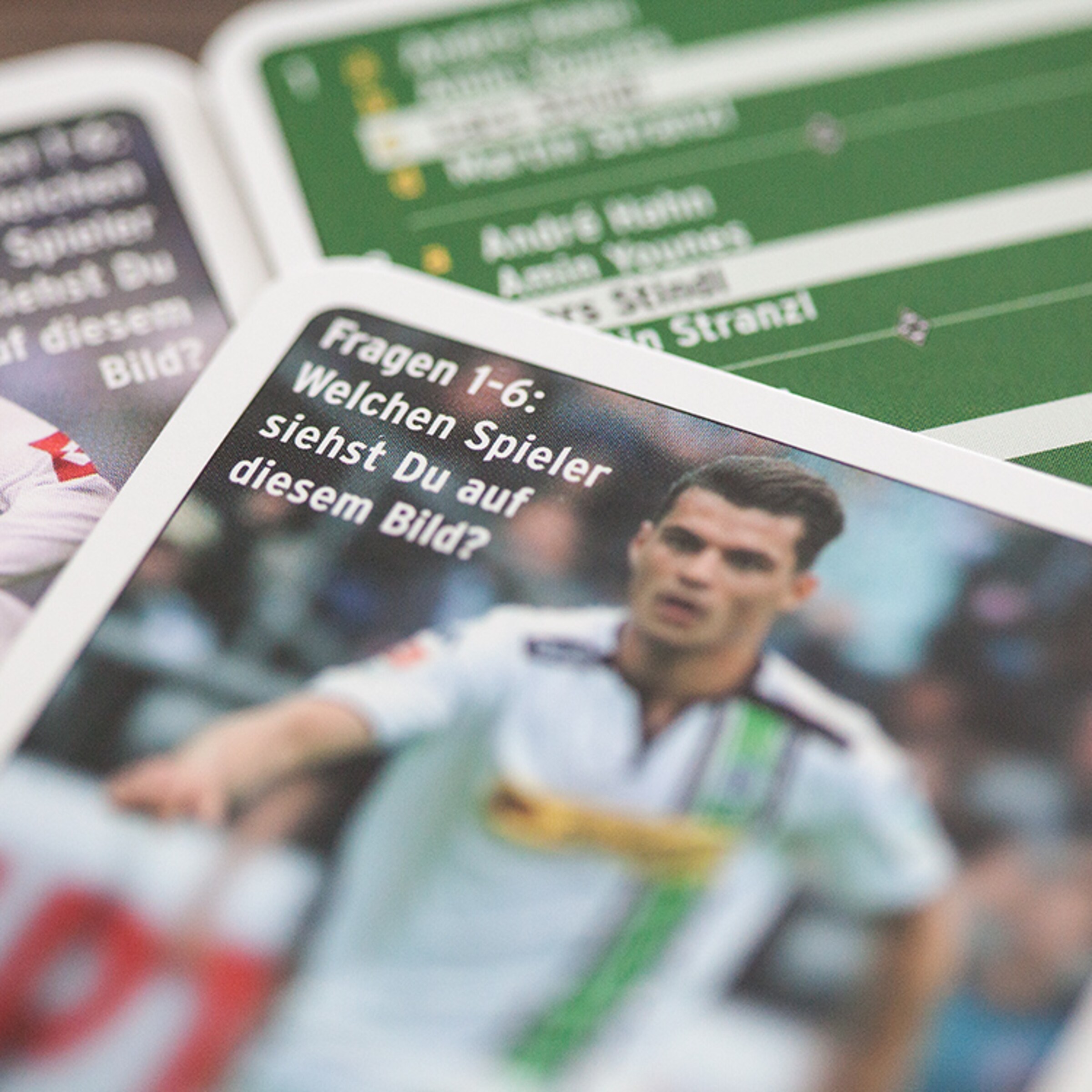 Fragenkarte mit der Frage welchen Spieler sieht man auf dem Bild?