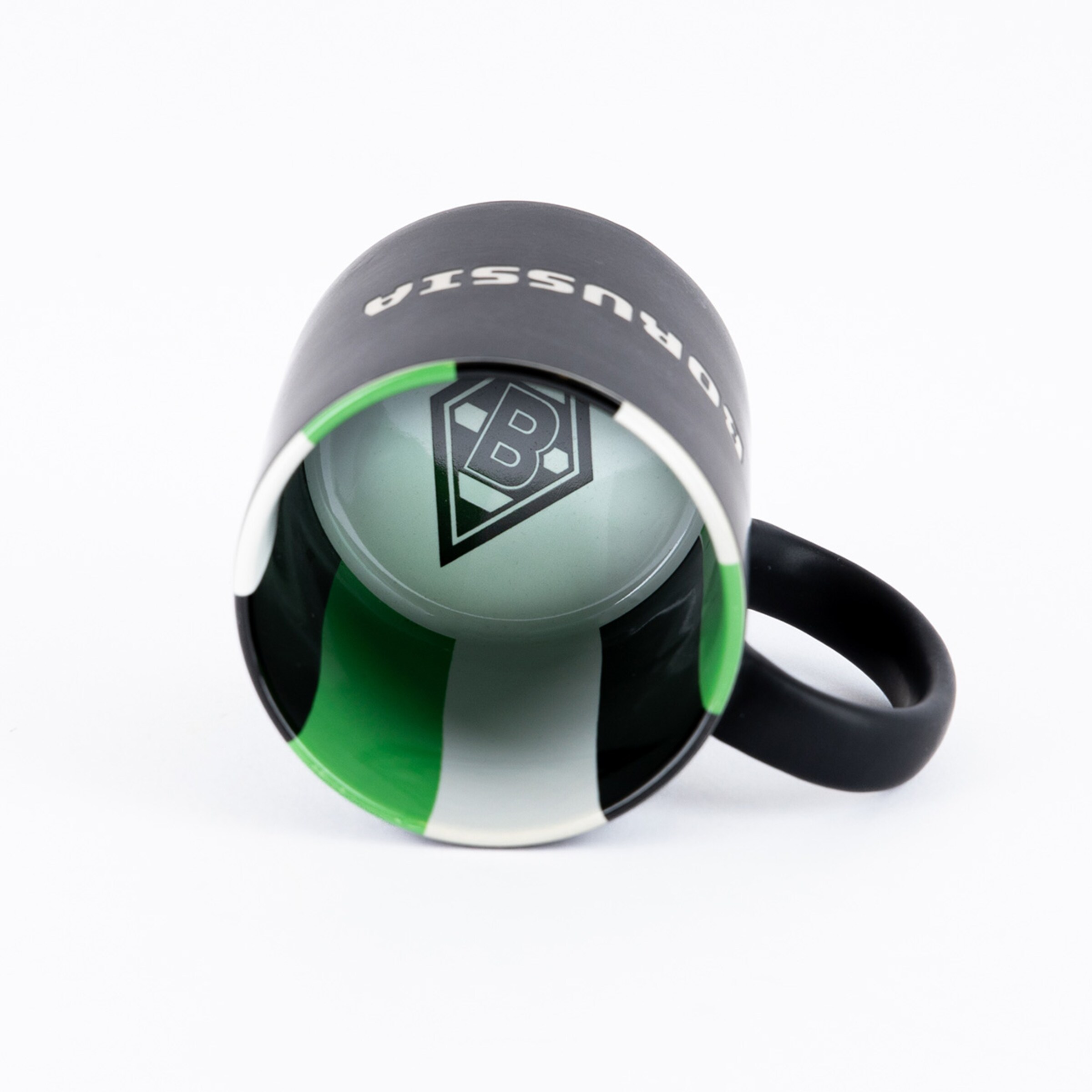 Black mug featuring Borussia Mönchengladbach logo and green-white stripes inside.