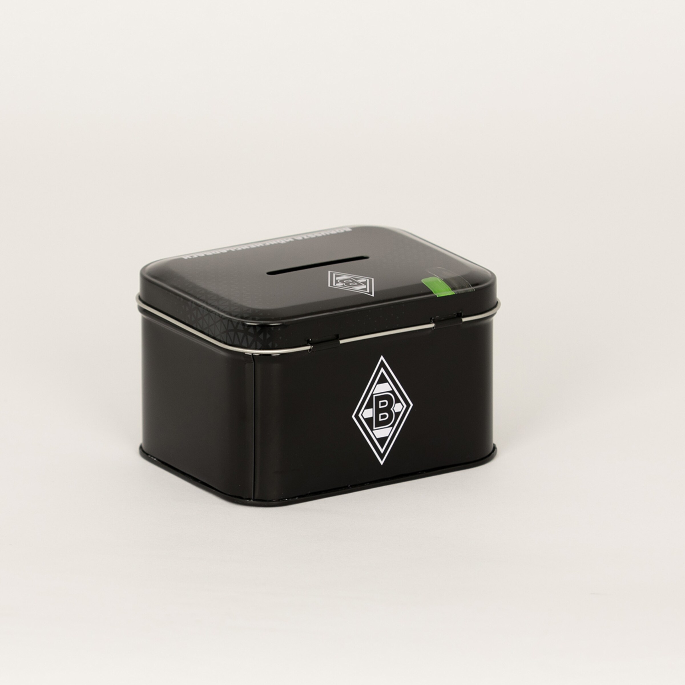 Black donation box featuring Borussia Mönchengladbach logo and slot for coins.