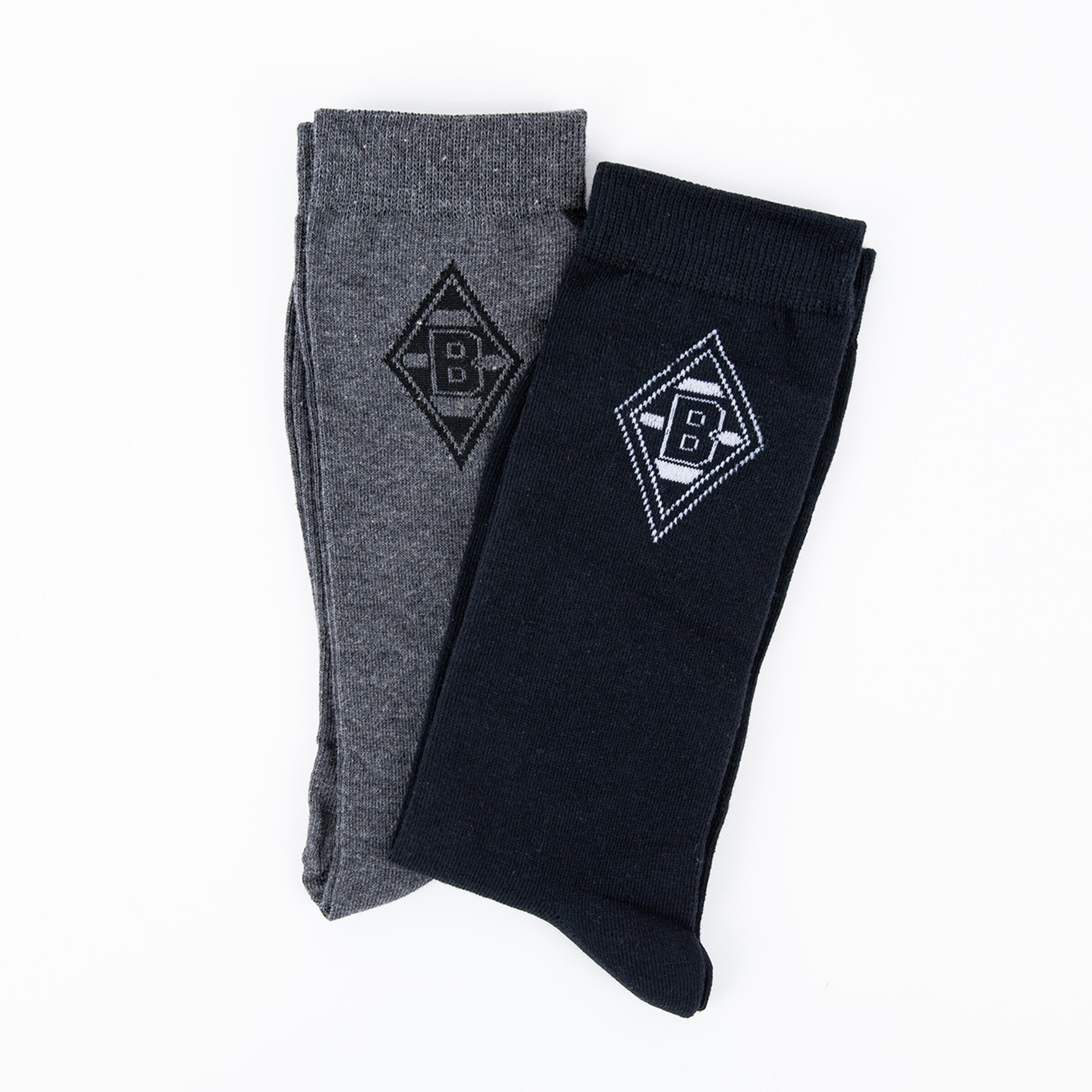 Schwarze und graue Socken mit dem Borussia Mönchengladbach Logo.