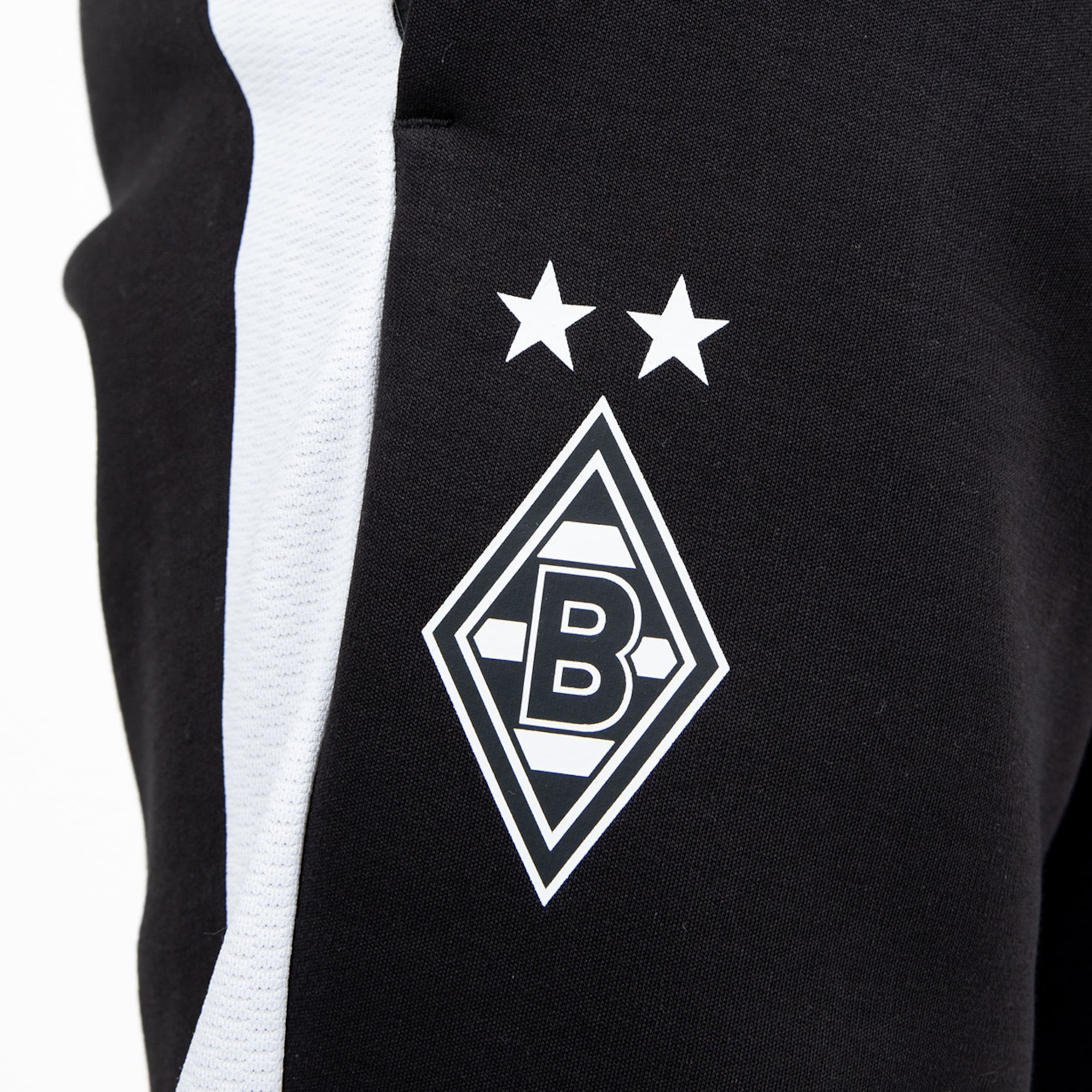 Schwarz-weiße Trainingshose mit Borussia Mönchengladbach-Logo und zwei Sternen.