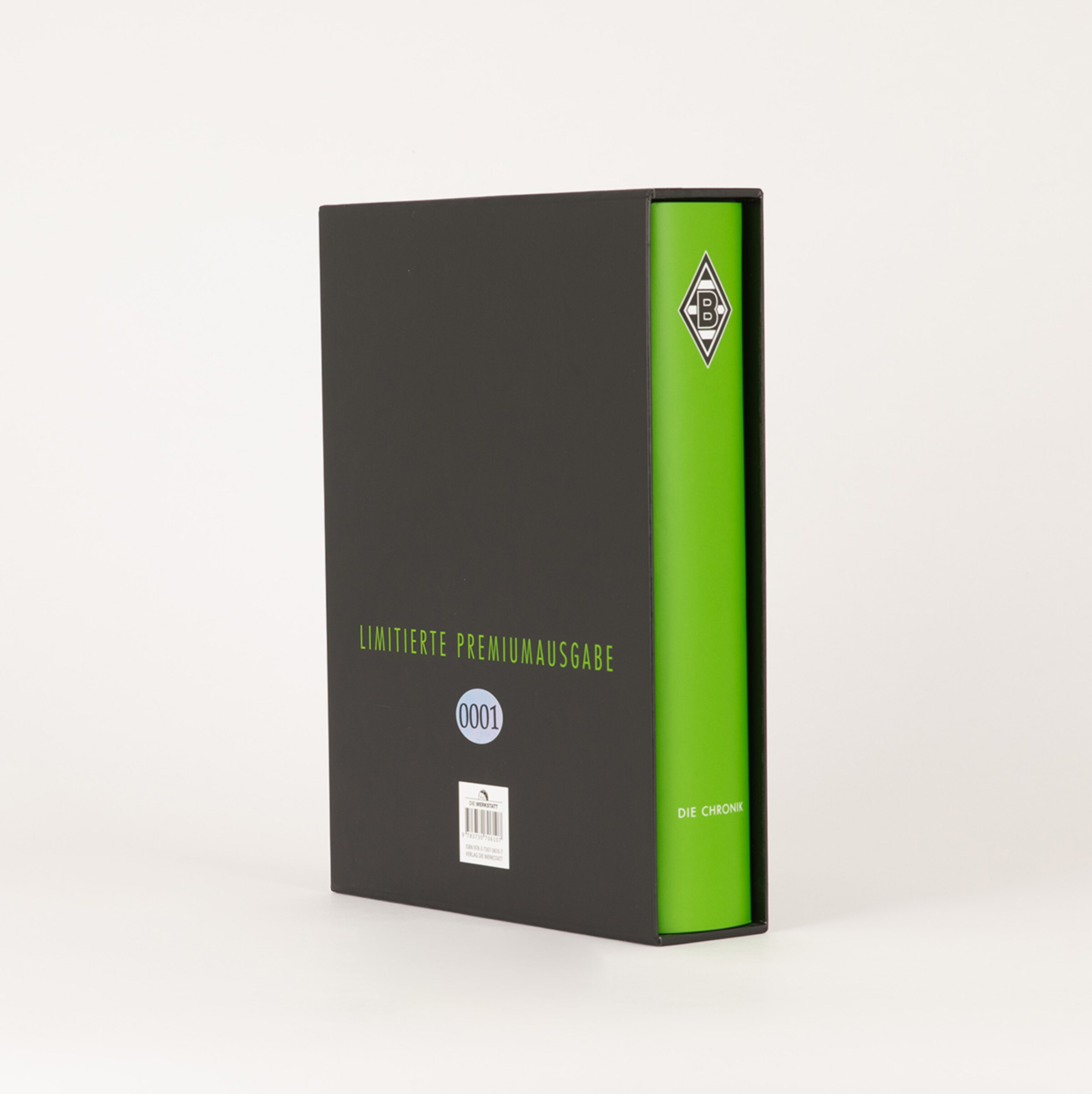 Black binder with green spine labeled LIMITED PREMIUM EDITION 0001.