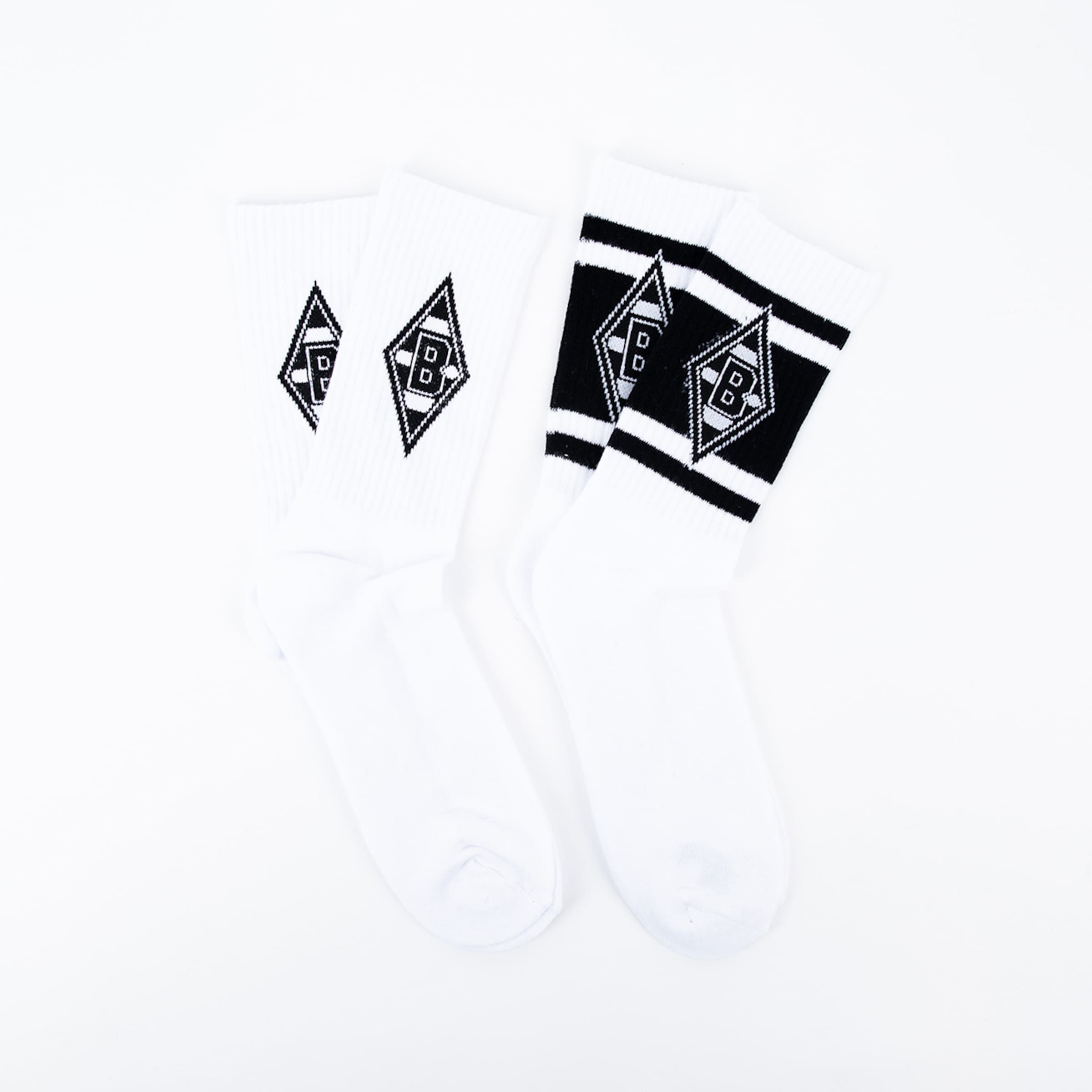 White socks featuring a black Borussia Mönchengladbach logo and stripes.