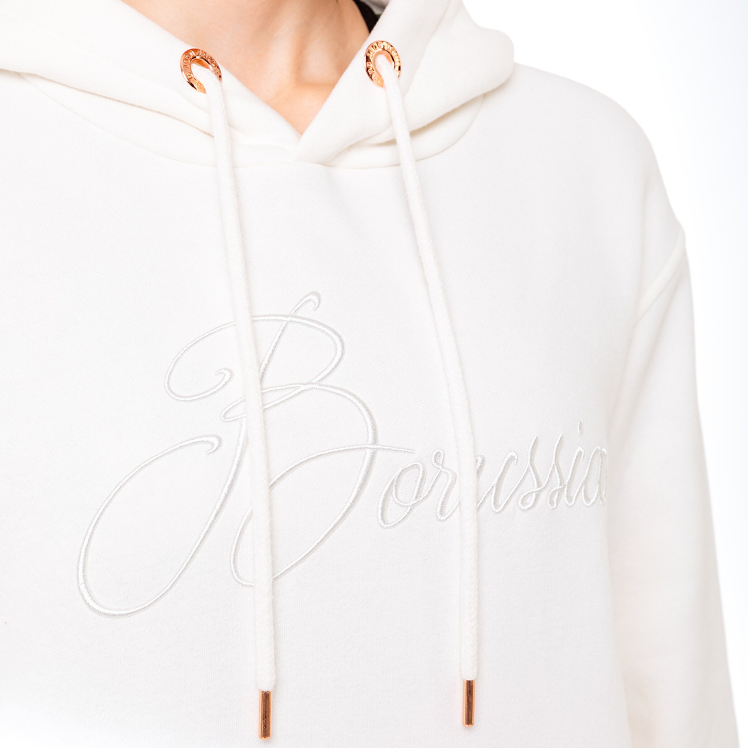 Weißer Kapuzenpullover mit gesticktem Schriftzug Borussia und goldfarbenen Ösen.