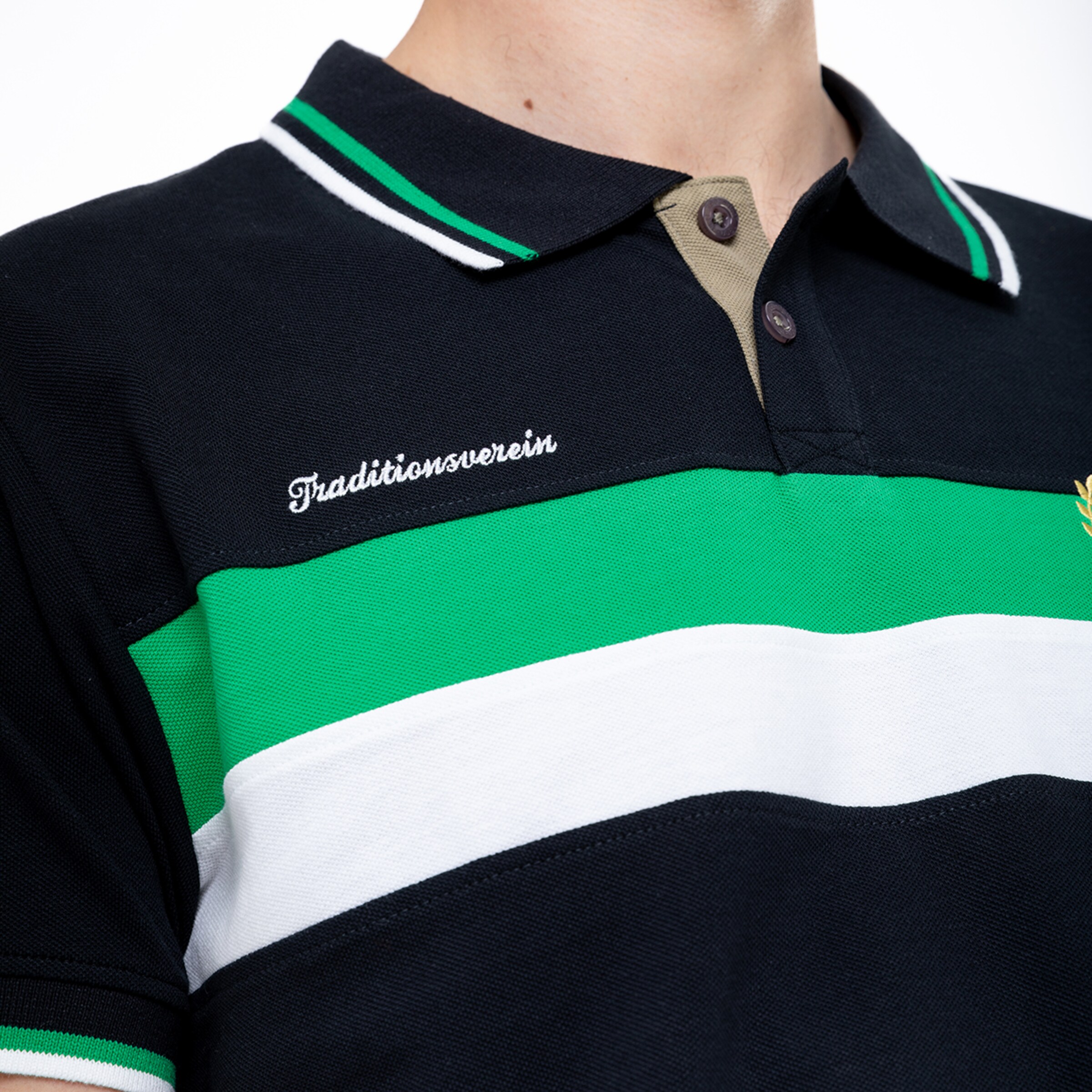 Polo shirt featuring green and white stripes with the text Traditionsverein