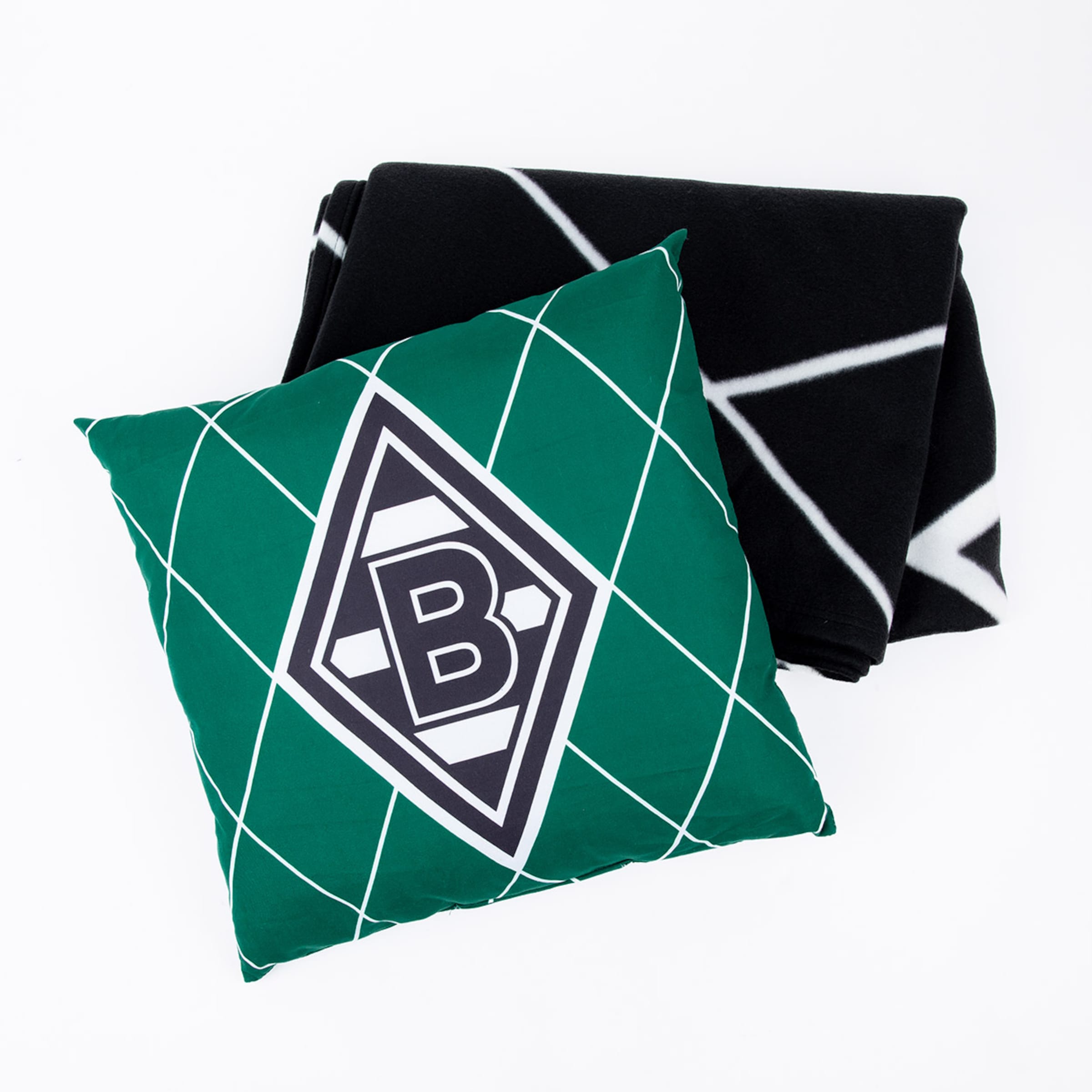 Kissen mit Borussia Mönchengladbach Logo und schwarzer Decke.