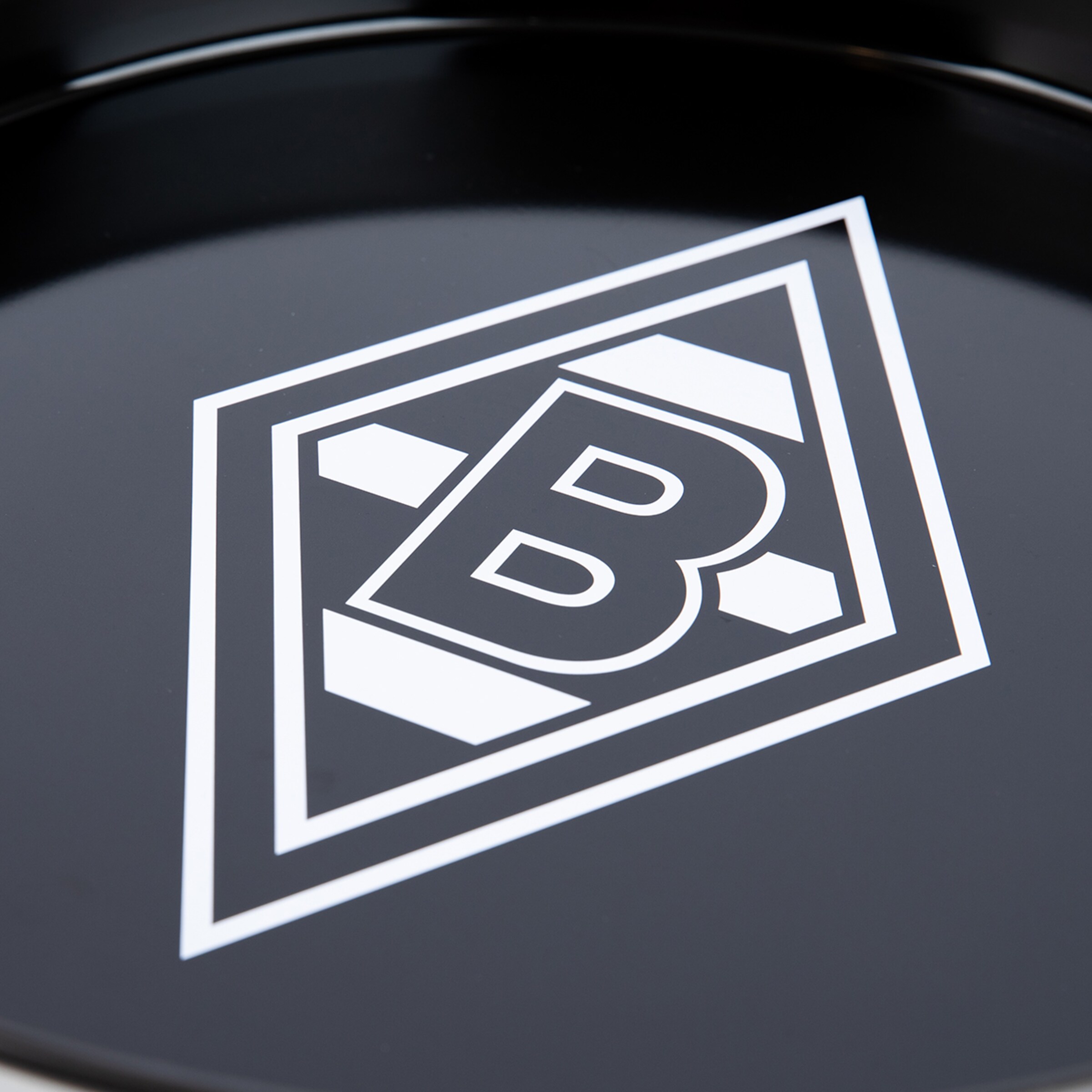 Shiny black tray featuring the white Borussia Mönchengladbach logo.