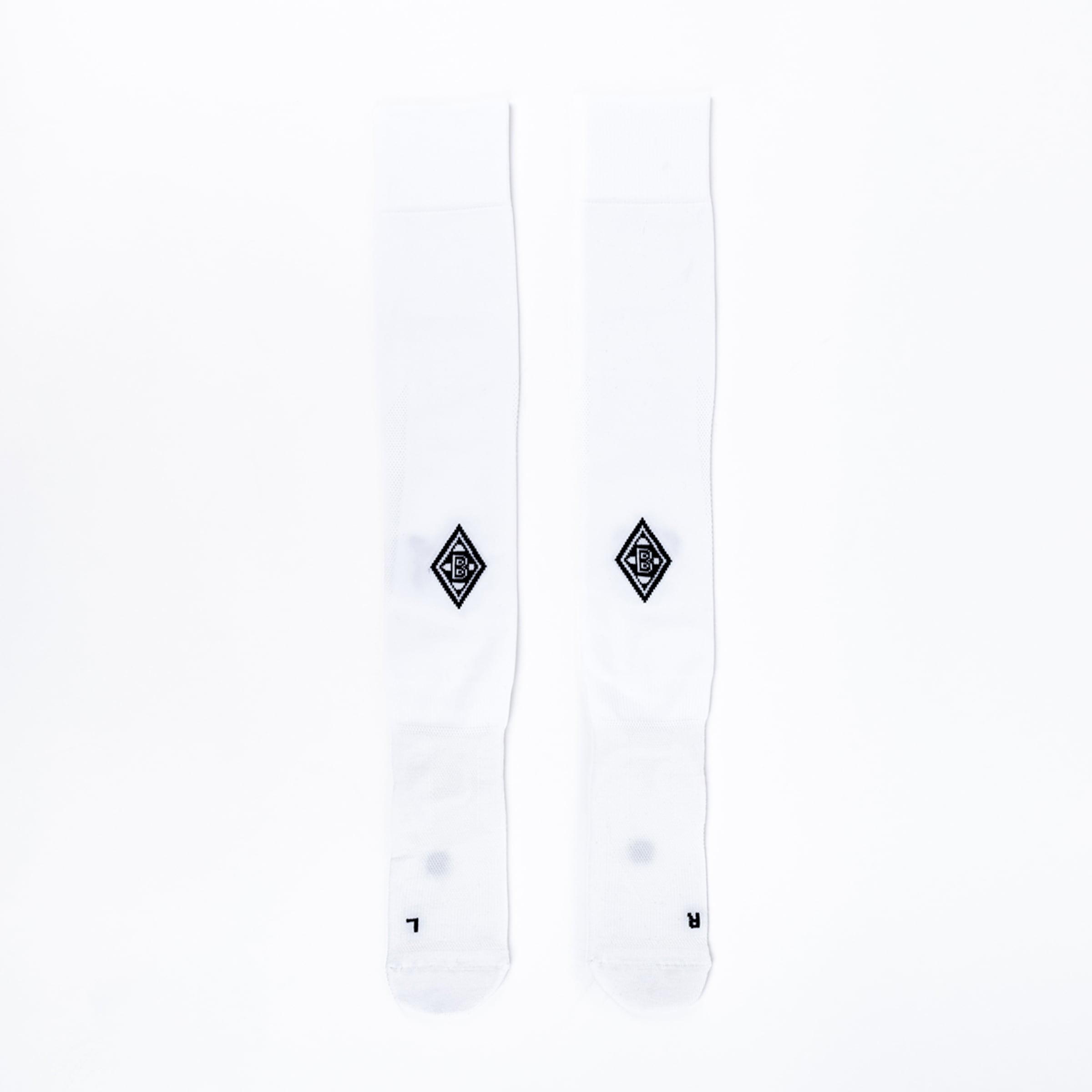 White socks featuring the black emblem of Borussia Mönchengladbach.