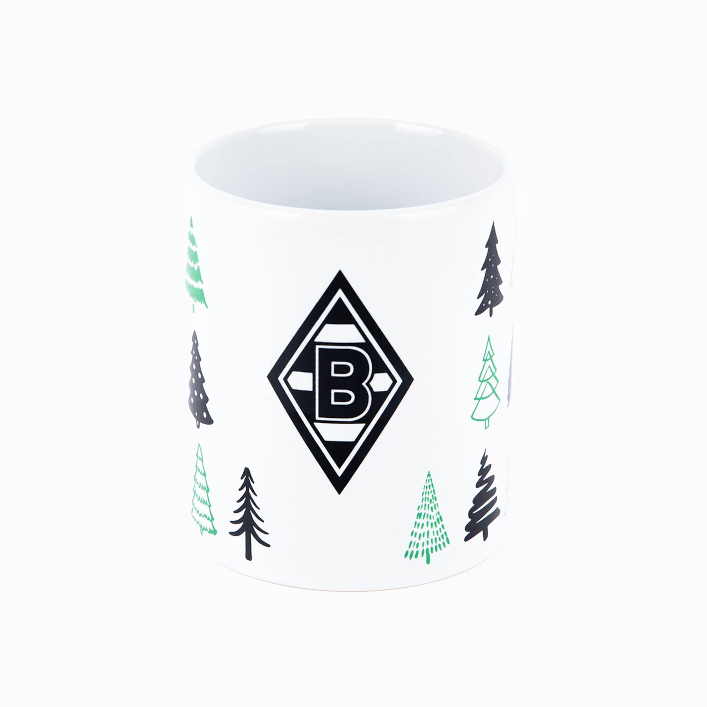 Keramiktasse mit grünen und schwarzen Tannenbäumen und dem Borussia Mönchengladbach Logo.