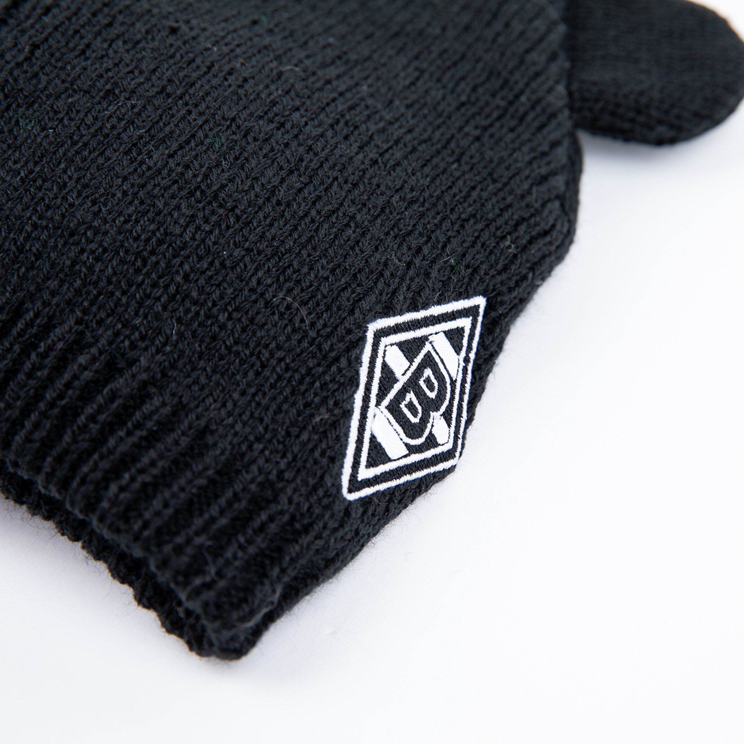 Schwarze Mütze mit dem Logo von Borussia Mönchengladbach.