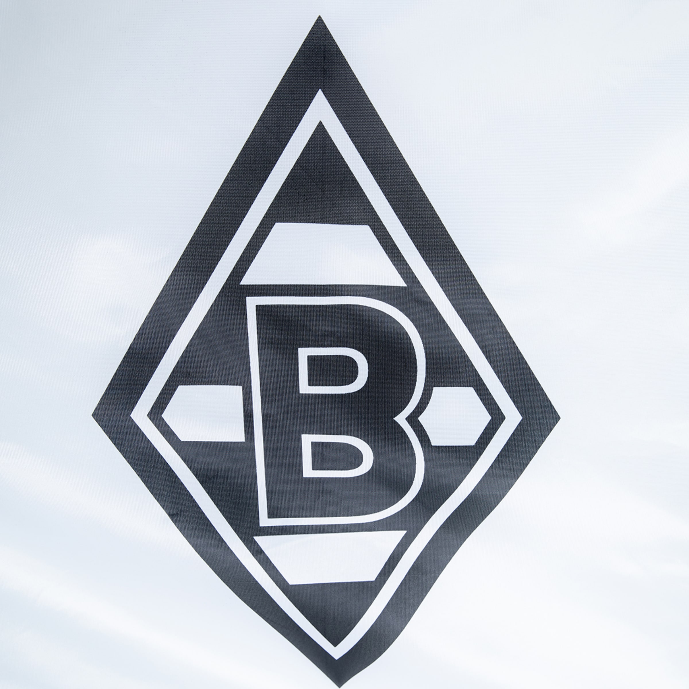 Schwarz-weißes Rauten-Logo von Borussia Mönchengladbach mit einem großen Buchstaben B in der Mitte.