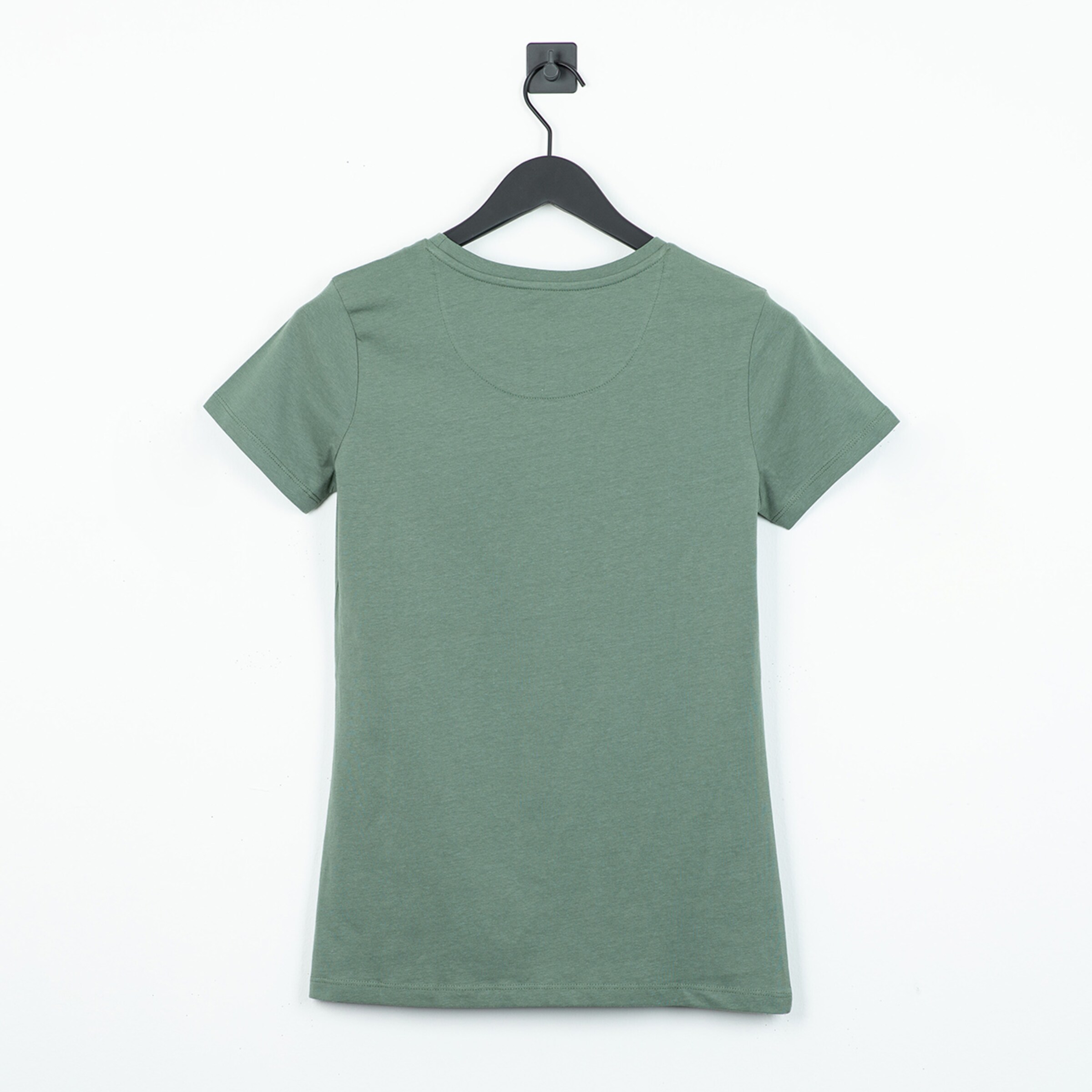 Back view of a green t-shirt on a hanger.