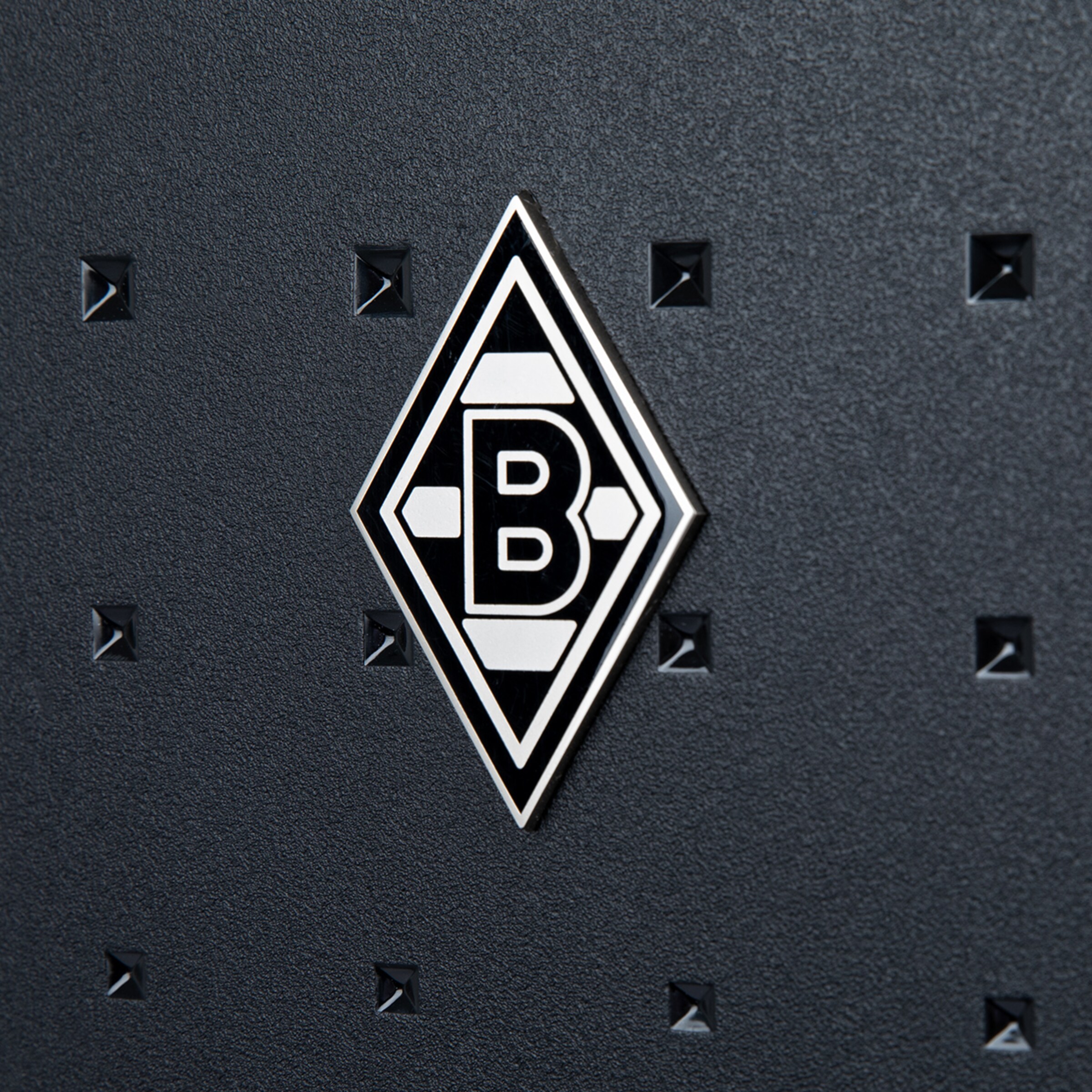 Logo von Borussia Mönchengladbach auf strukturiertem Hintergrund