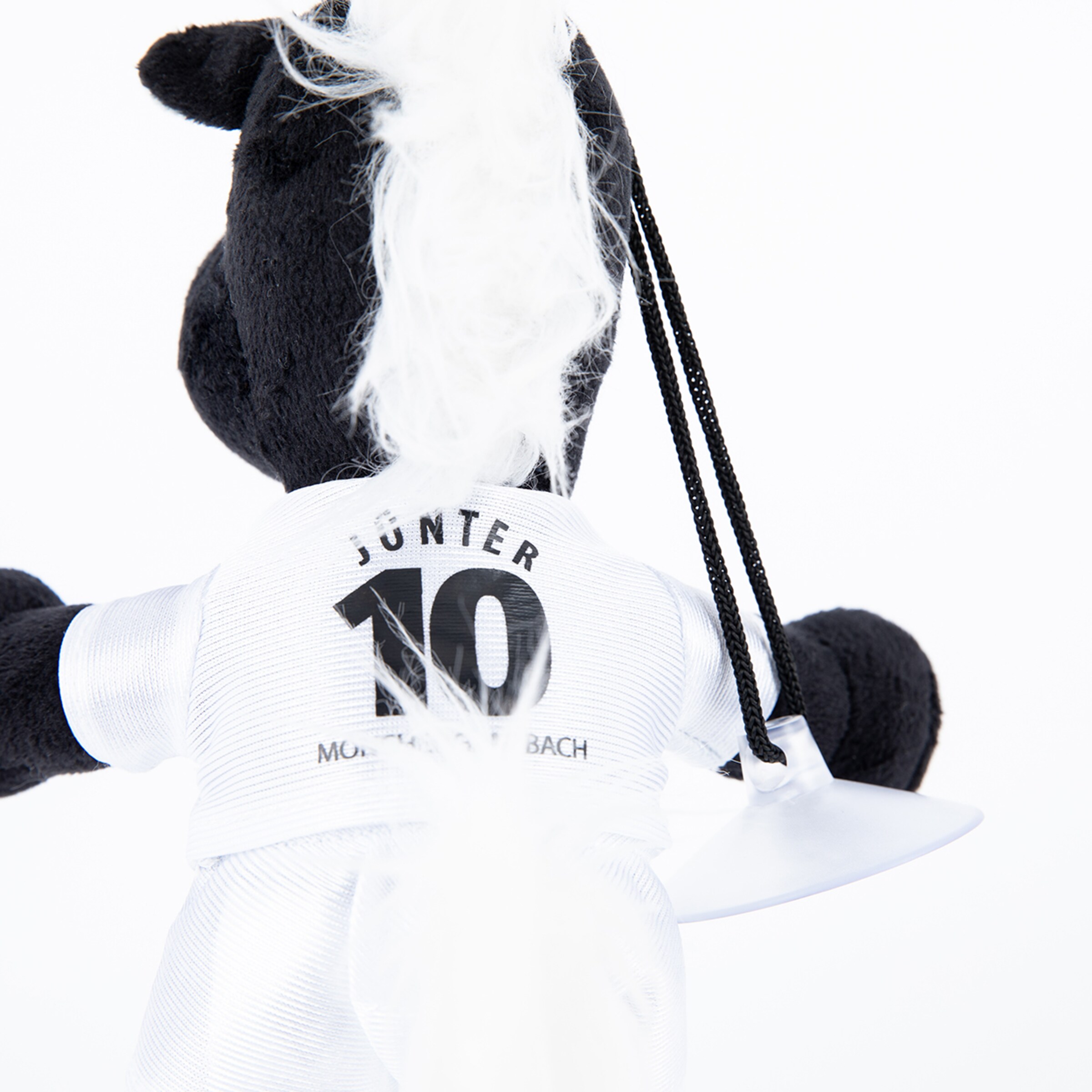 Plüschtier Jünter in einer weißen Borussia Mönchengladbach-Trikotausrüstung.