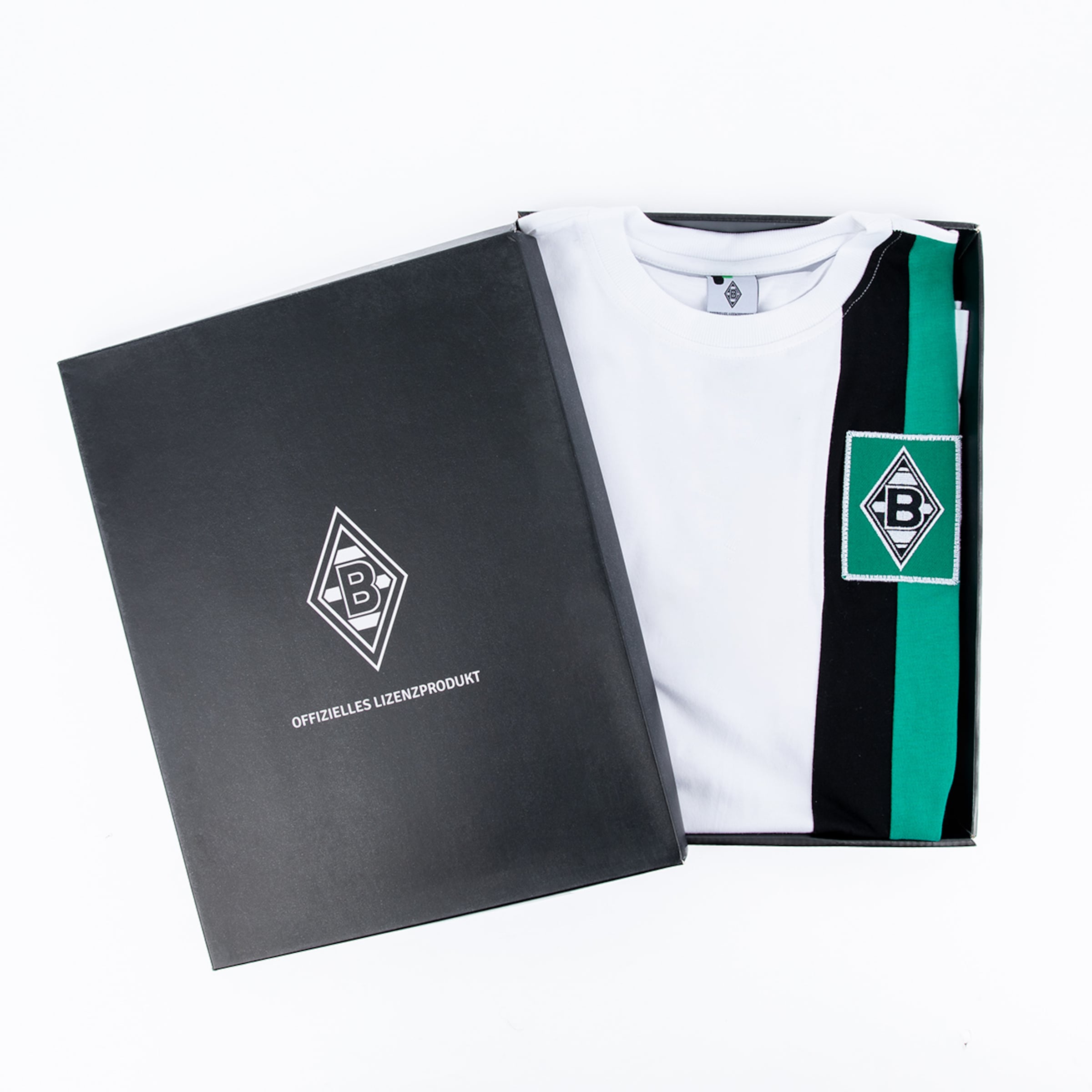 Ein T-Shirt der Borussia Mönchengladbach in einer eleganten Geschenkbox.