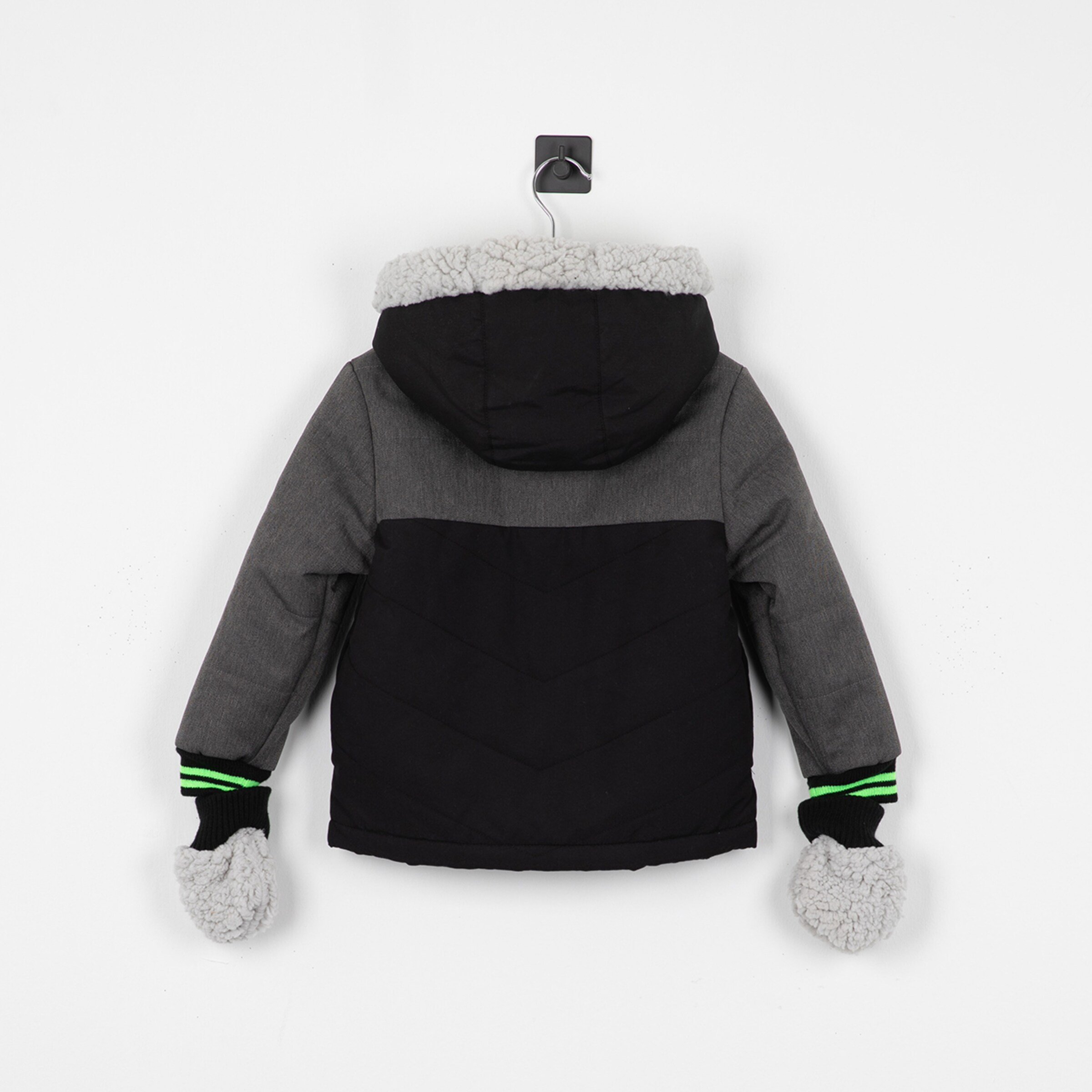 Back view of a grey and black winter jacket with a hood and lined gloves.