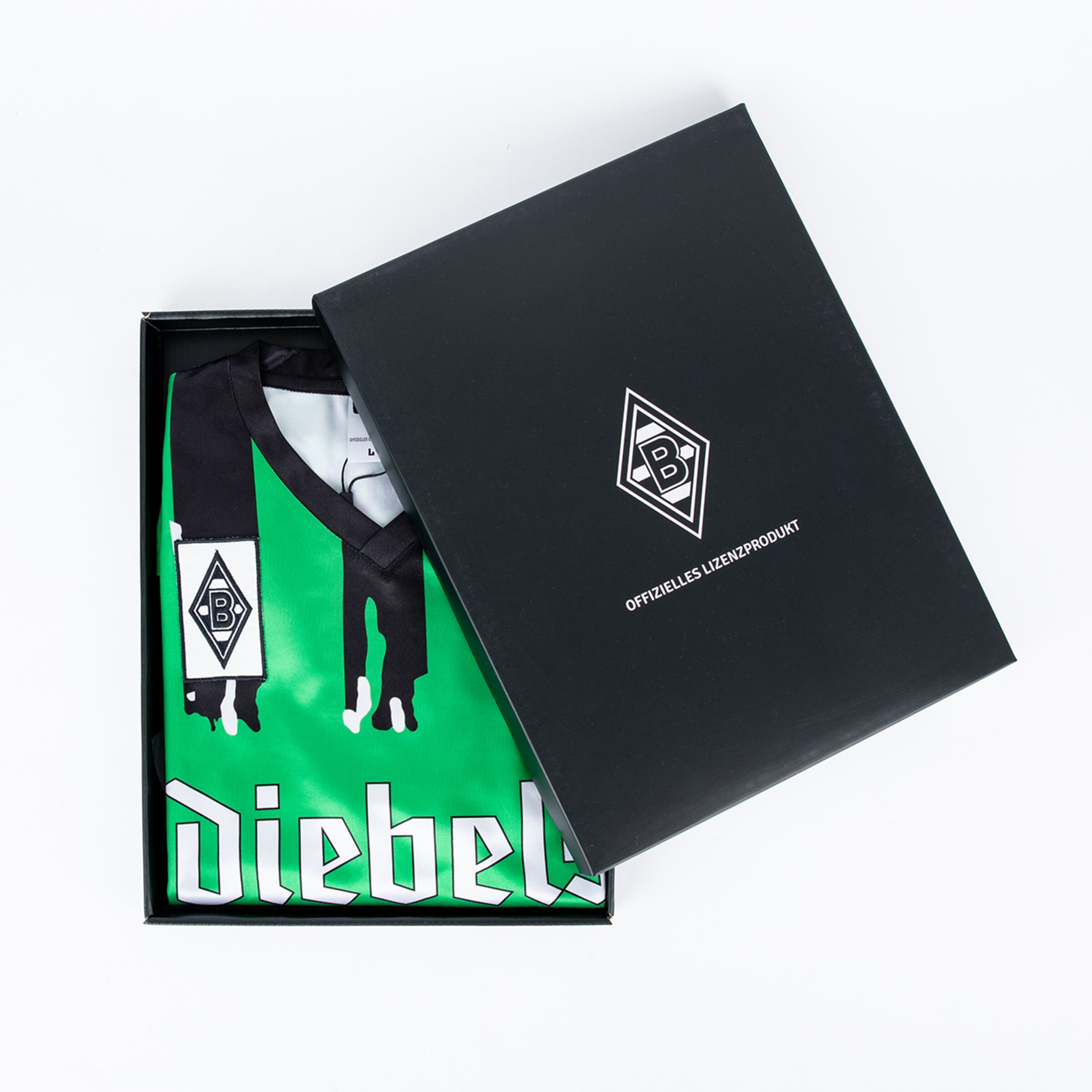 Offizielles Borussia Mönchengladbach-Trikot in einer Geschenkbox.