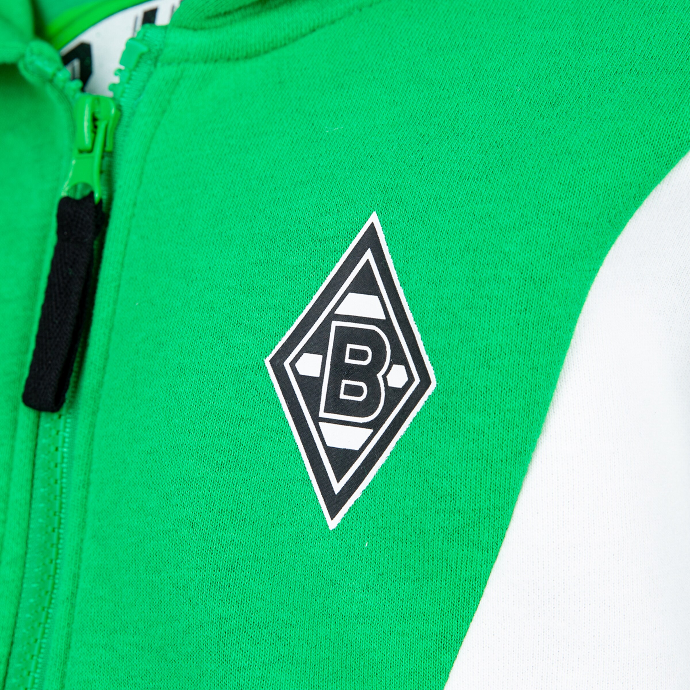 Close-up of a green hoodie featuring the Borussia Mönchengladbach logo.