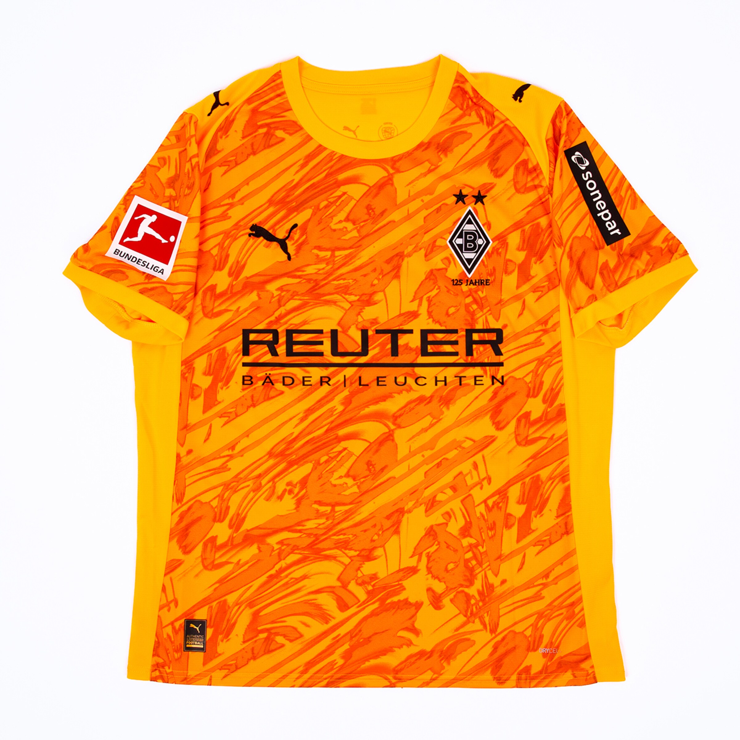 Yellow and orange Borussia Mönchengladbach goalkeeper jersey by Puma with Reuter sponsor logo, club crest, and Bundesliga sleeve patch.