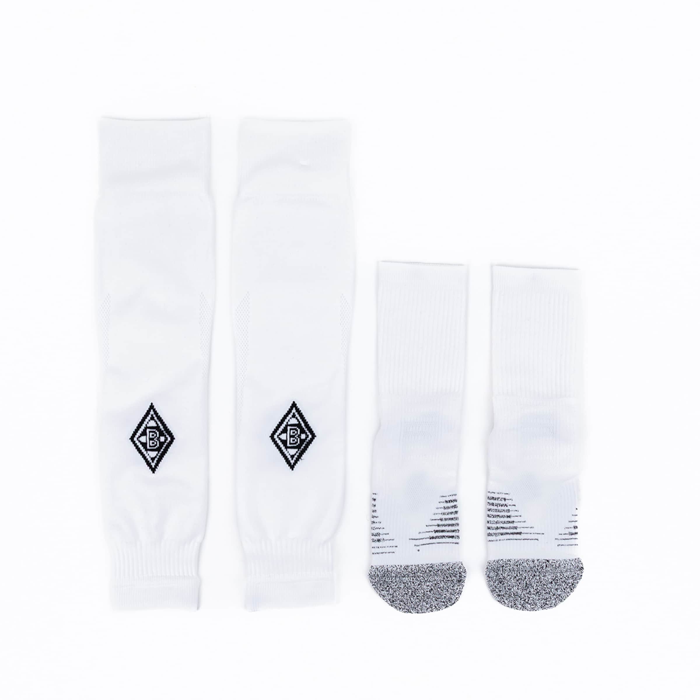 White soccer socks featuring a black Borussia Mönchengladbach logo and gray silicone dots.