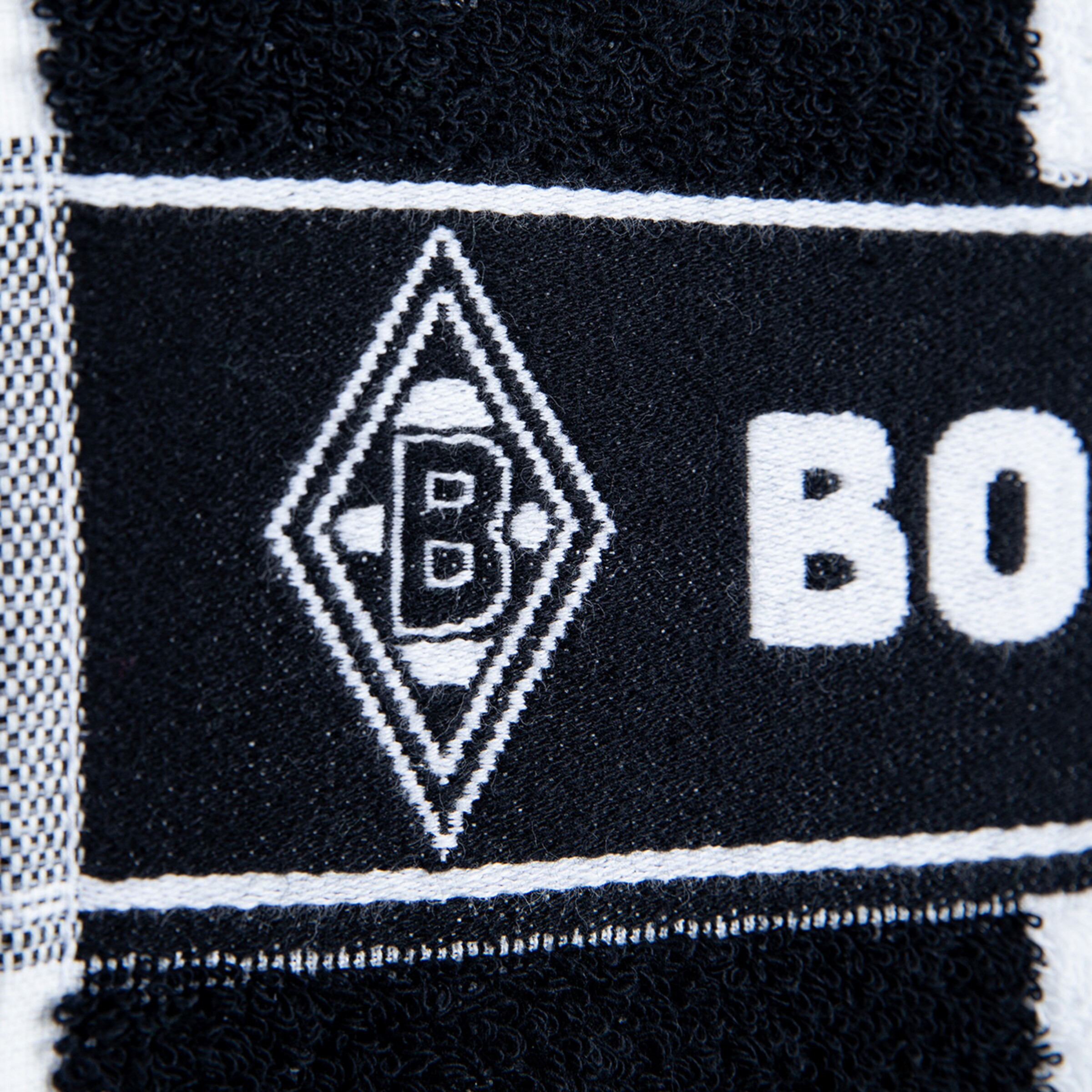 Close-up of Borussia Mönchengladbach logo on a towel.