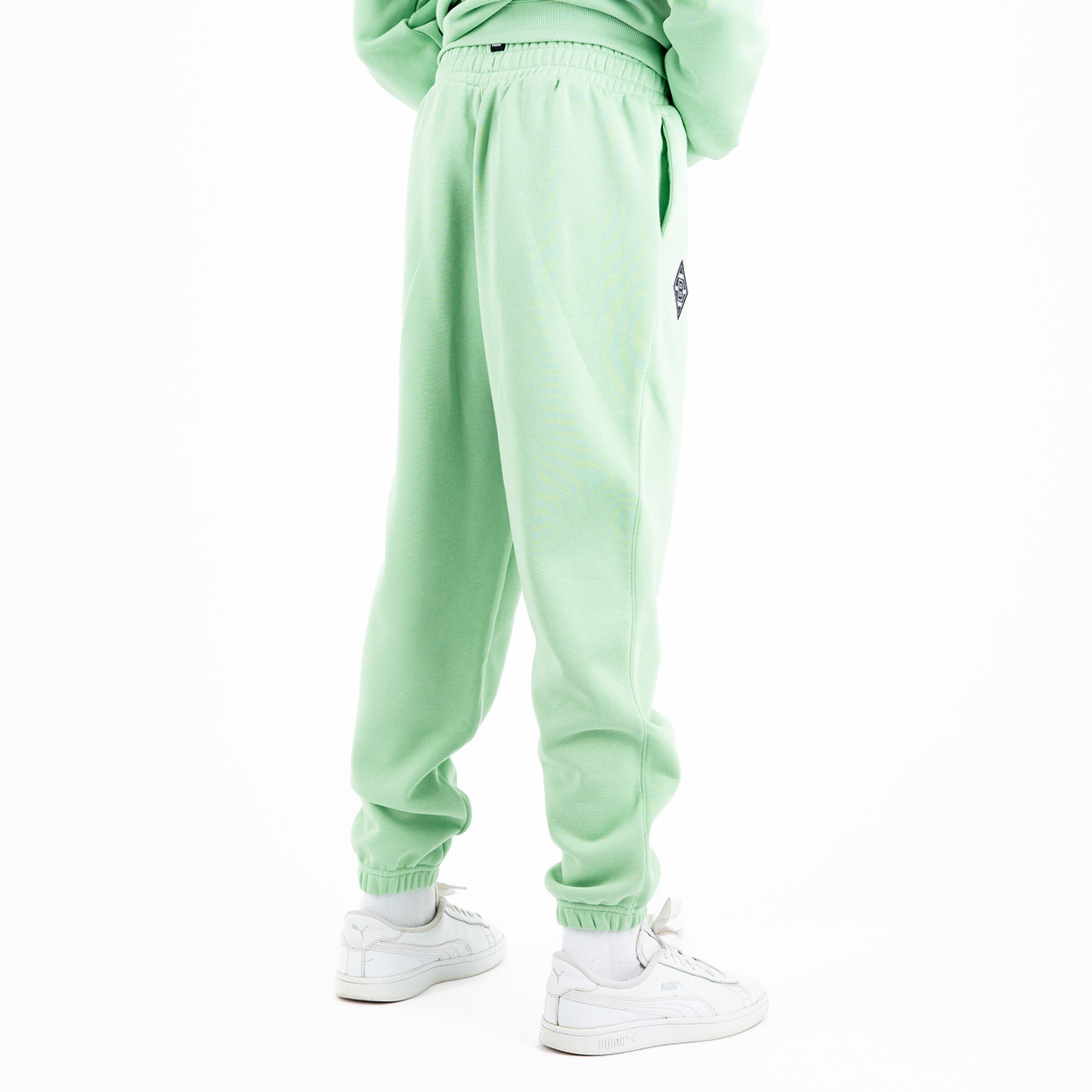 Mintgrüne Jogginghose aus Sweatstoff mit elastischem Bund und seitlichen Taschen.