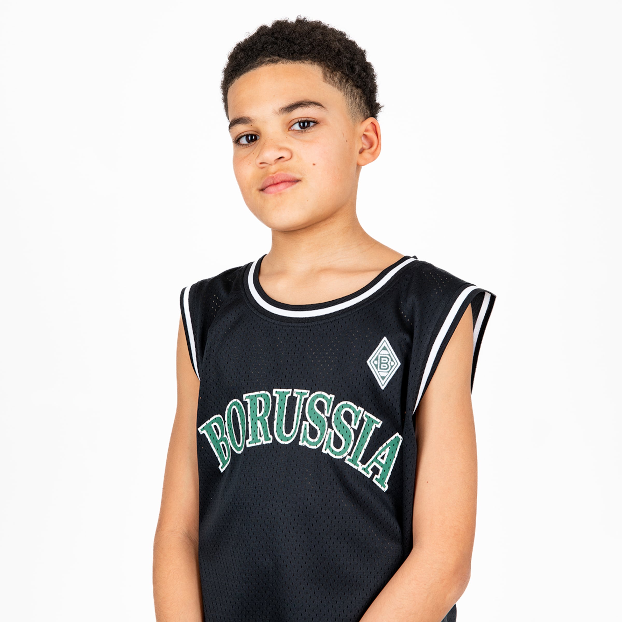 A boy wearing a black jersey with BORUSSIA written on it.
