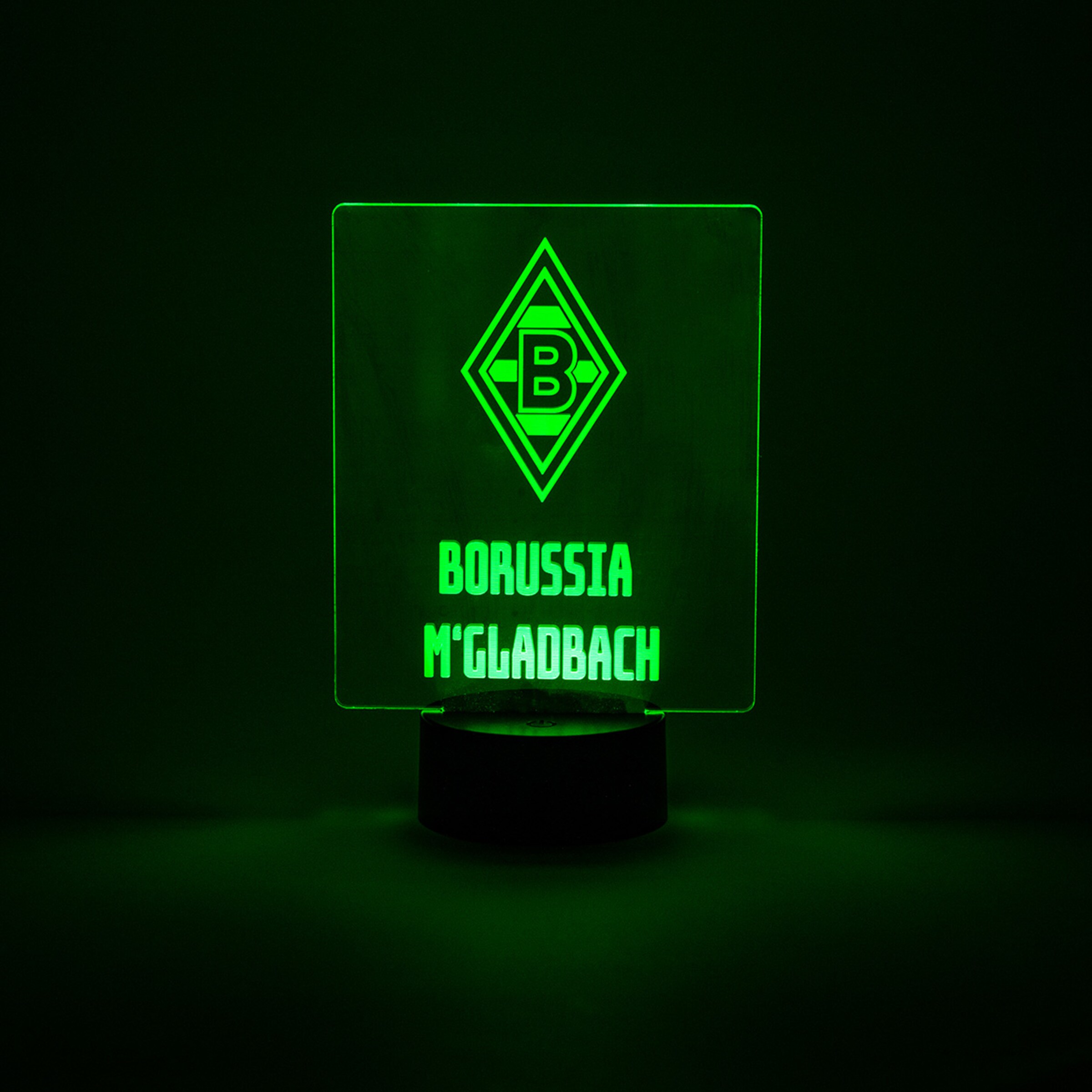 Leuchtschild mit dem Logo von Borussia Mönchengladbach in grüner Beleuchtung
