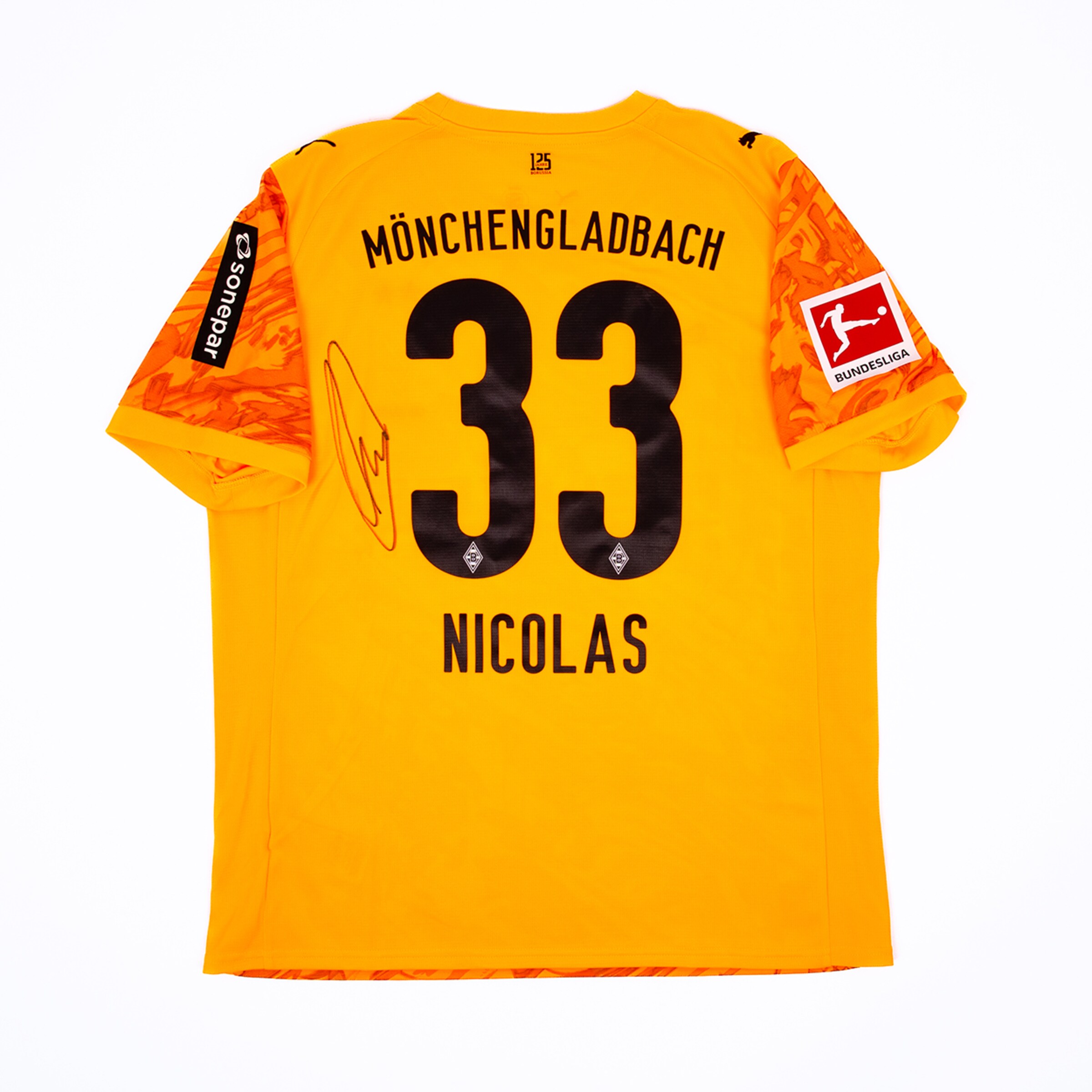 Yellow Mönchengladbach jersey, back view with number 33, name NICOLAS, autograph, and Bundesliga patch on the sleeve.