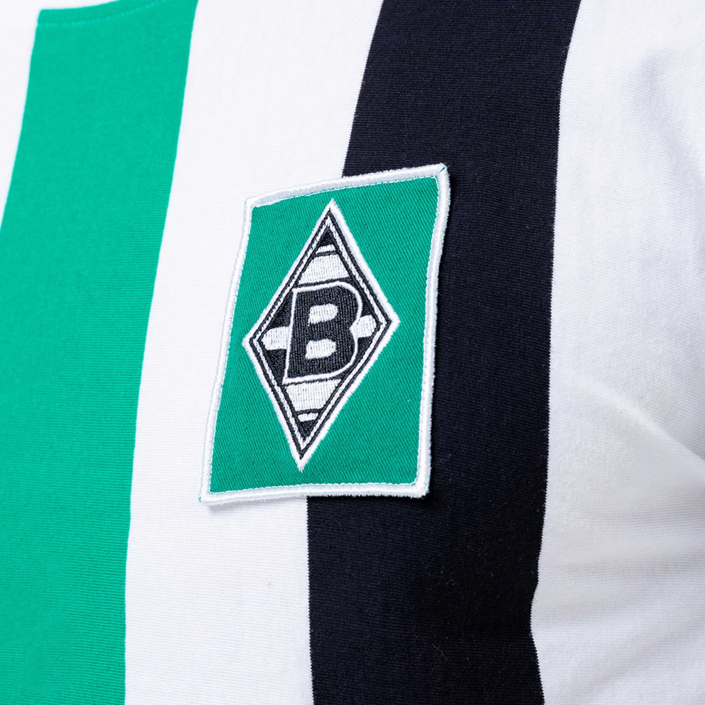 Wappen von Borussia Mönchengladbach auf einem Trikot.