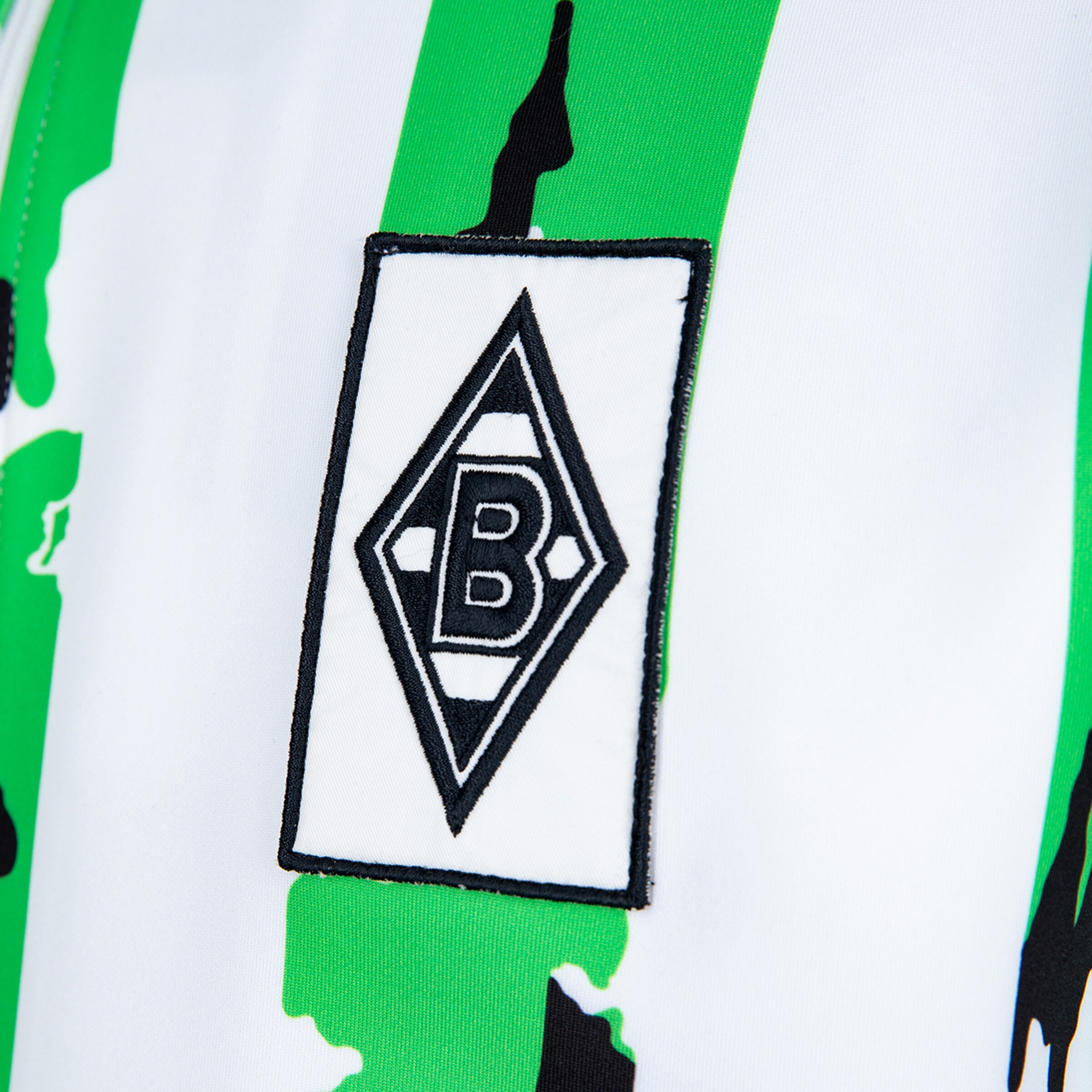 Logo of Borussia Mönchengladbach on a jersey.