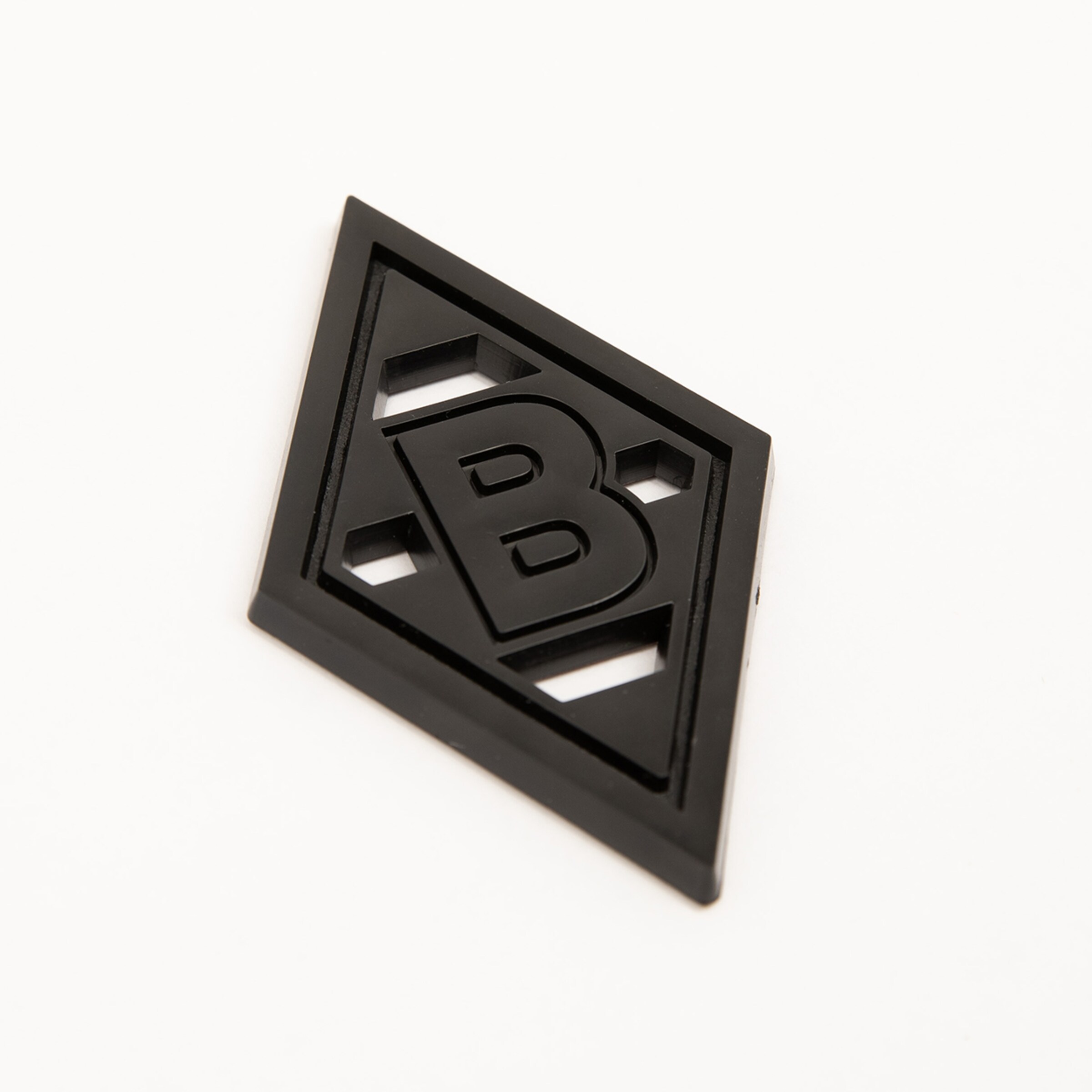 Black triangular badge featuring the B logo of Borussia Mönchengladbach.