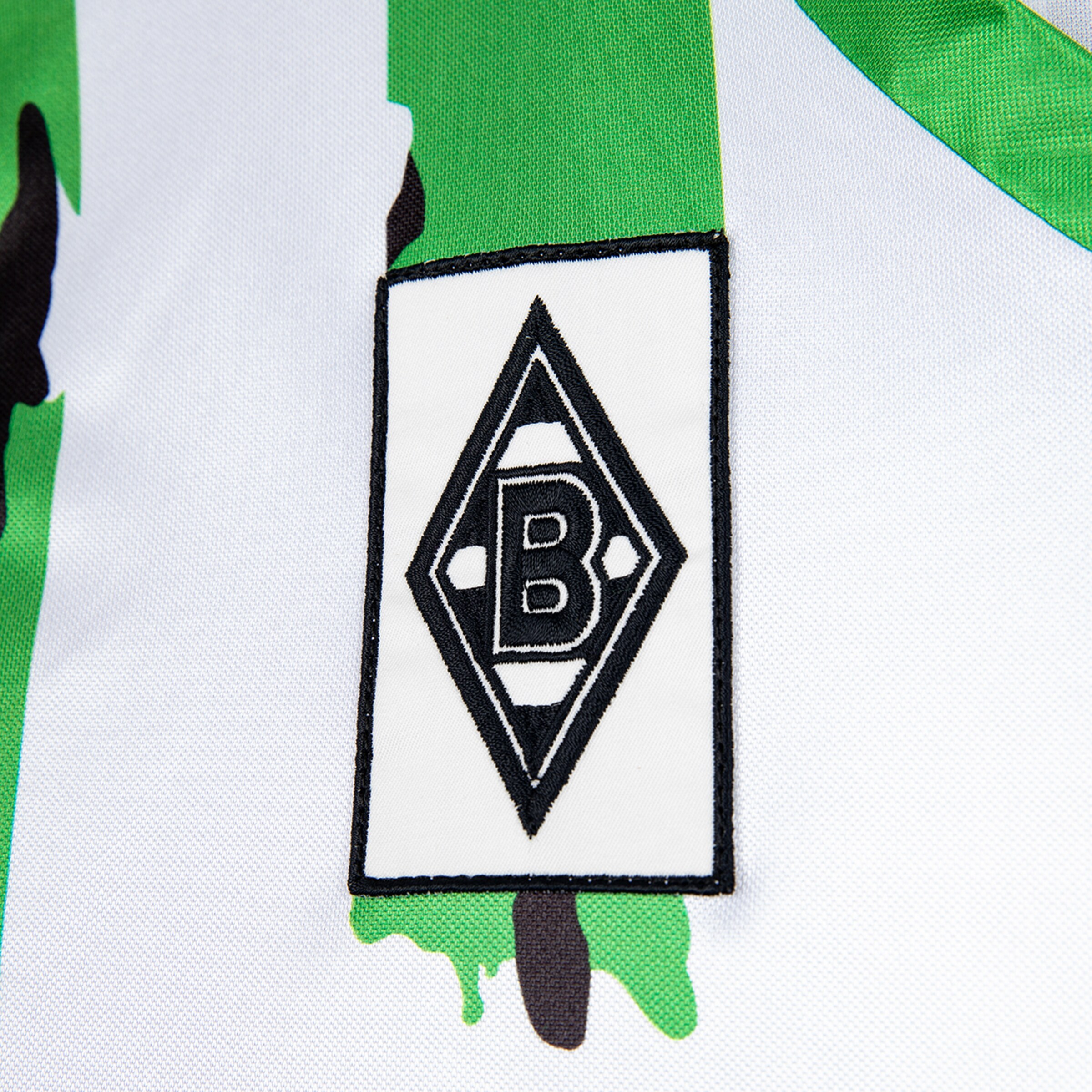 Das Emblem von Borussia Mönchengladbach auf einem Jersey.