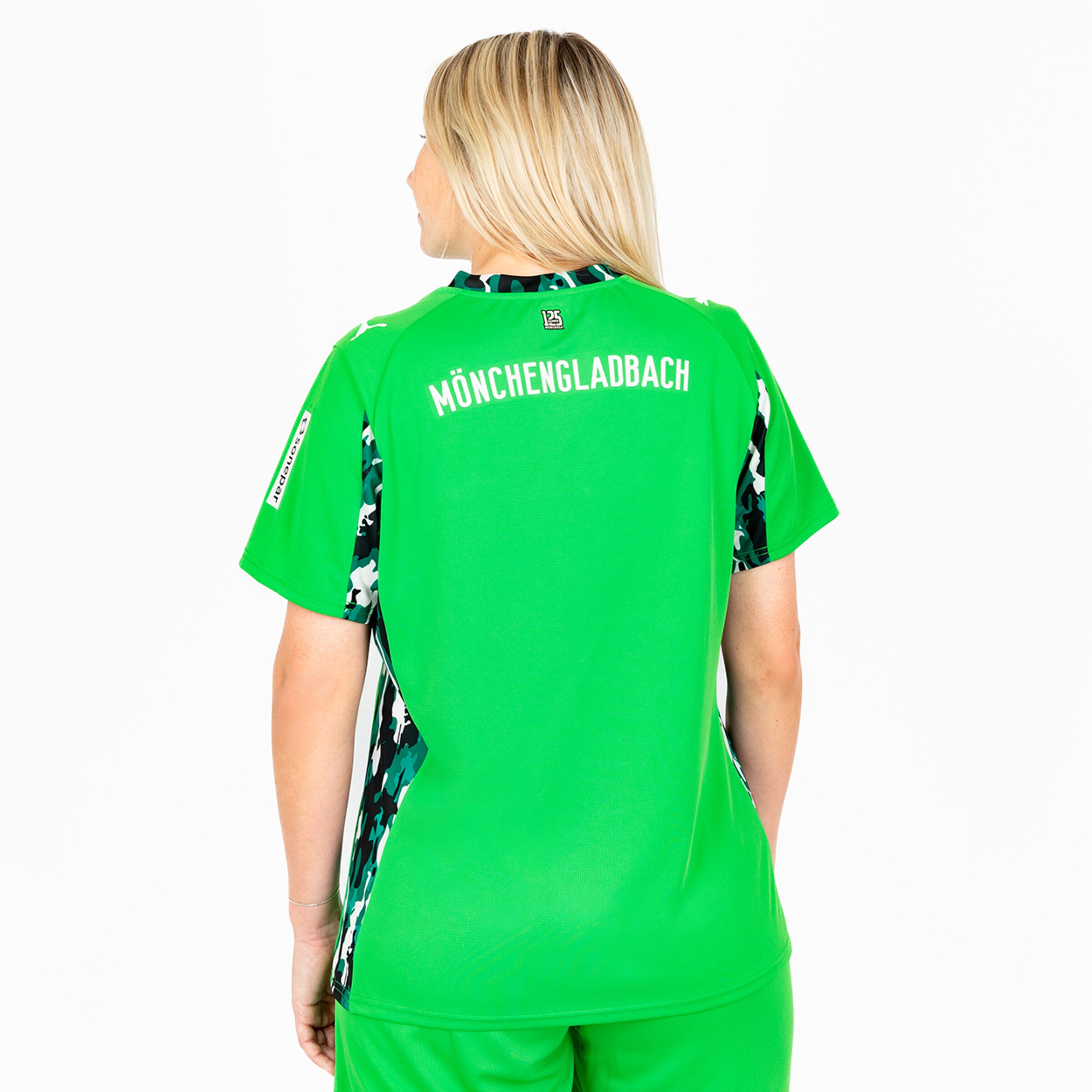 Green sports jersey of Borussia Mönchengladbach back view with MÖNCHENGLADBACH inscription.