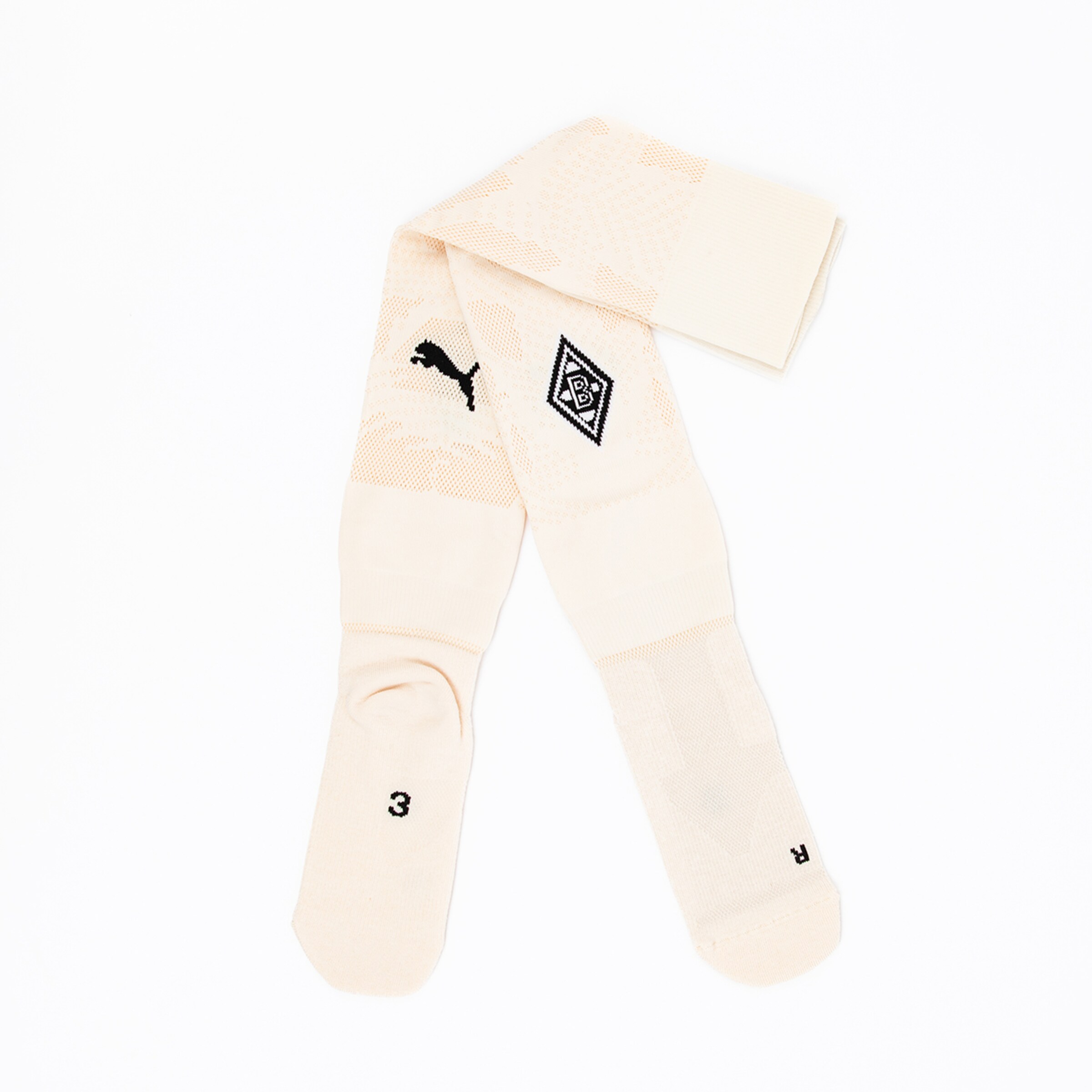 Beige Socken mit Puma-Logo und Borussia Mönchengladbach-Wappen.