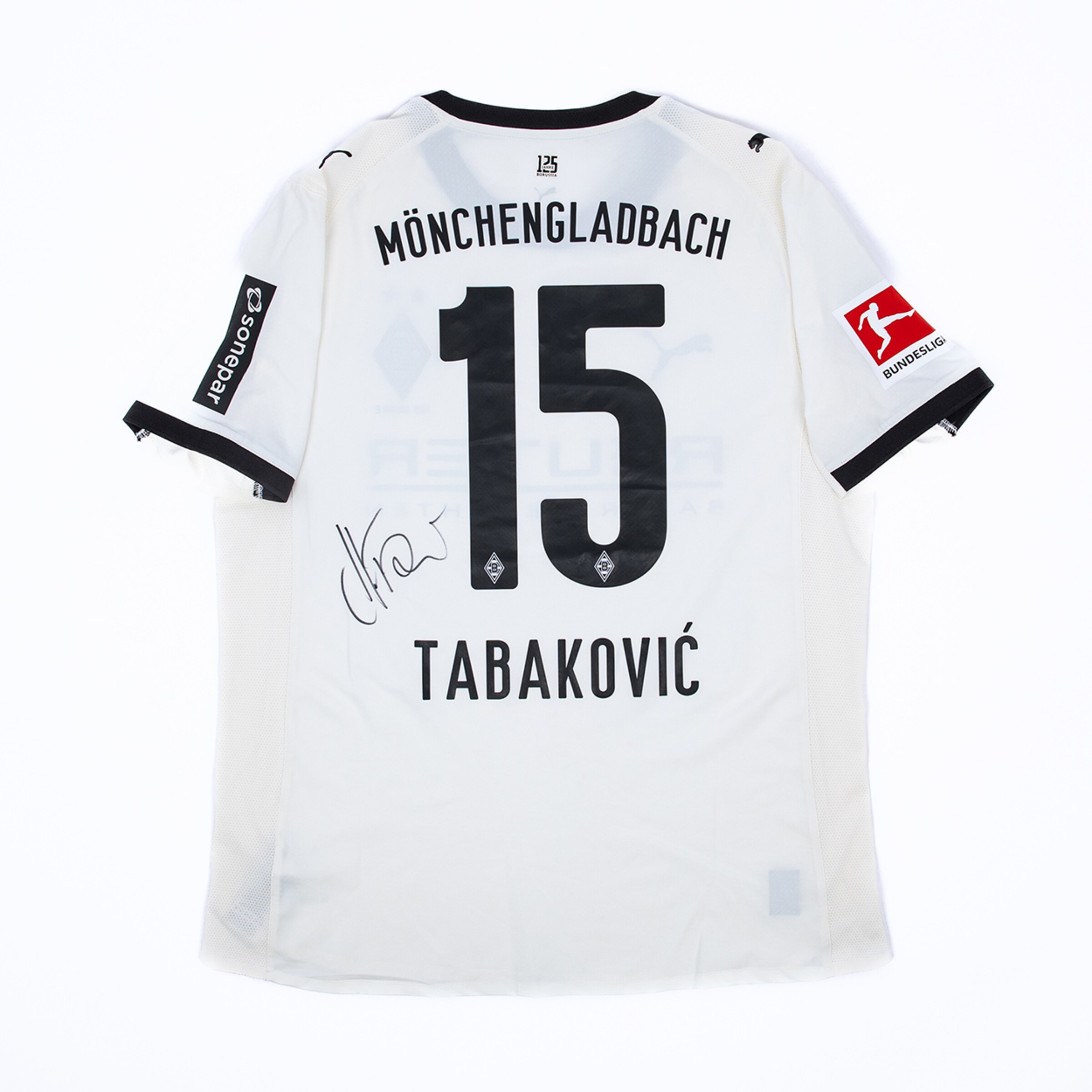Autographed white Borussia Mönchengladbach jersey, back view with number 15 Tabaković and Bundesliga patch.