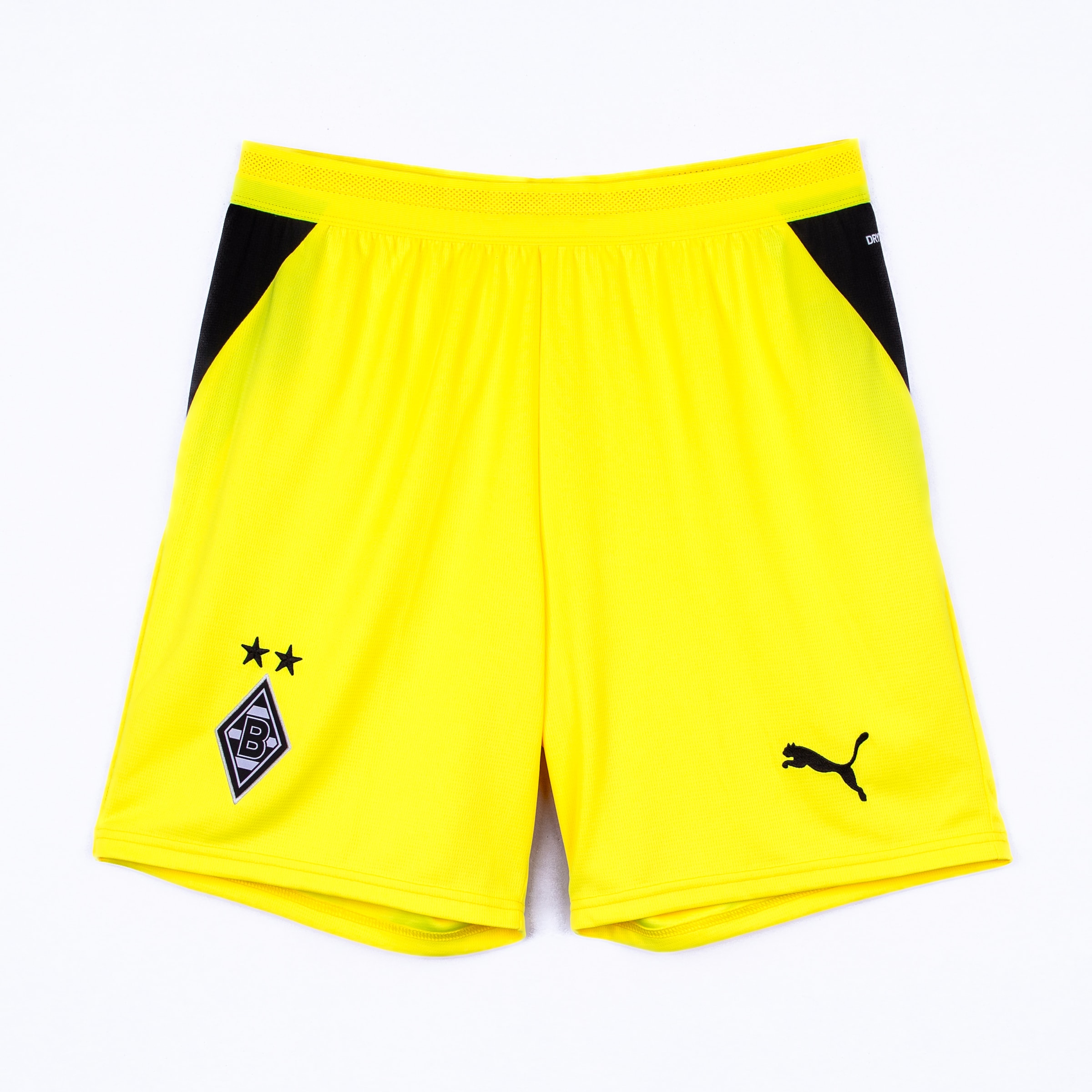 Yellow Puma sports shorts with Borussia Mönchengladbach crest, two stars, and black side panels.