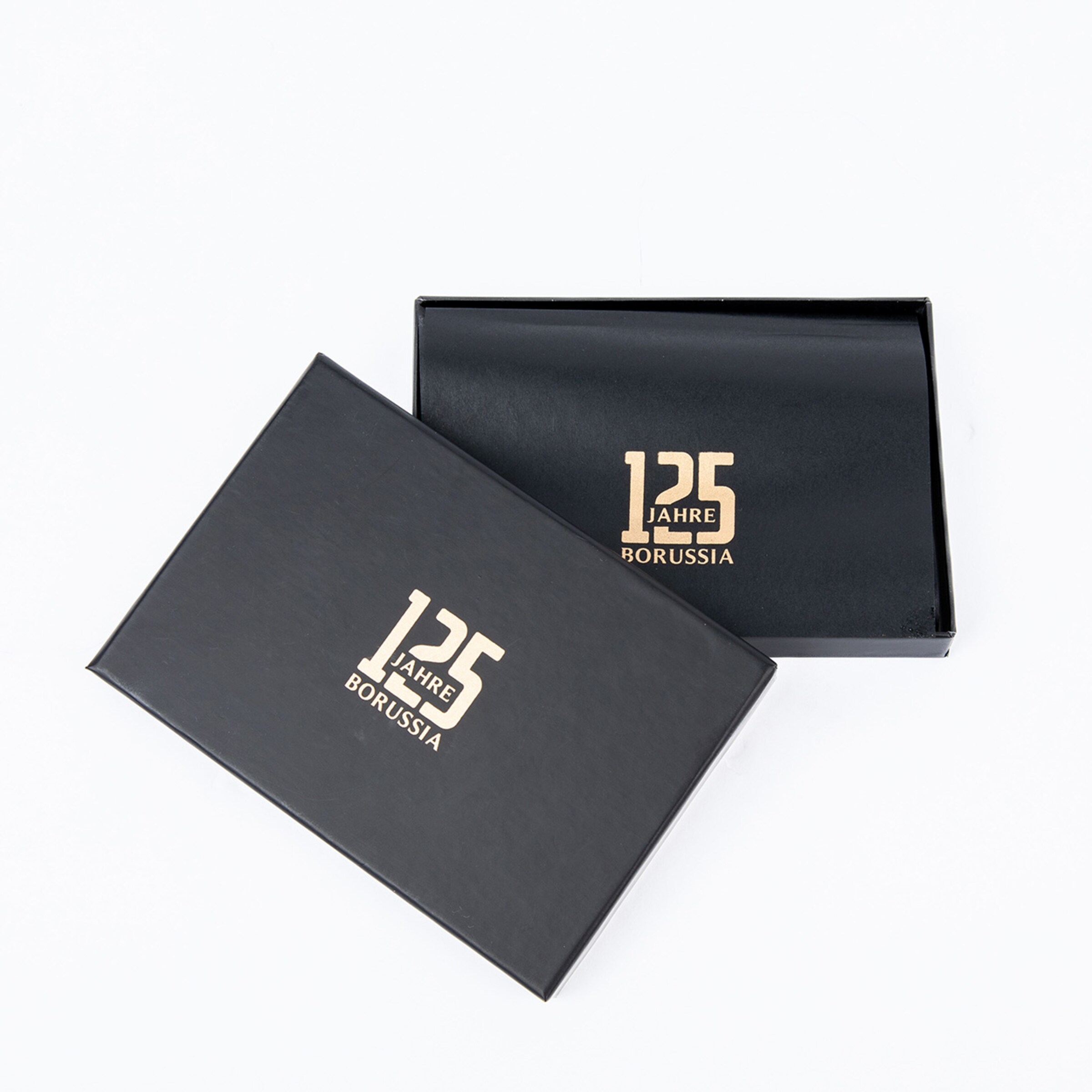 Schwarze Geschenkschachtel mit goldener Schrift 125 Jahre Borussia.