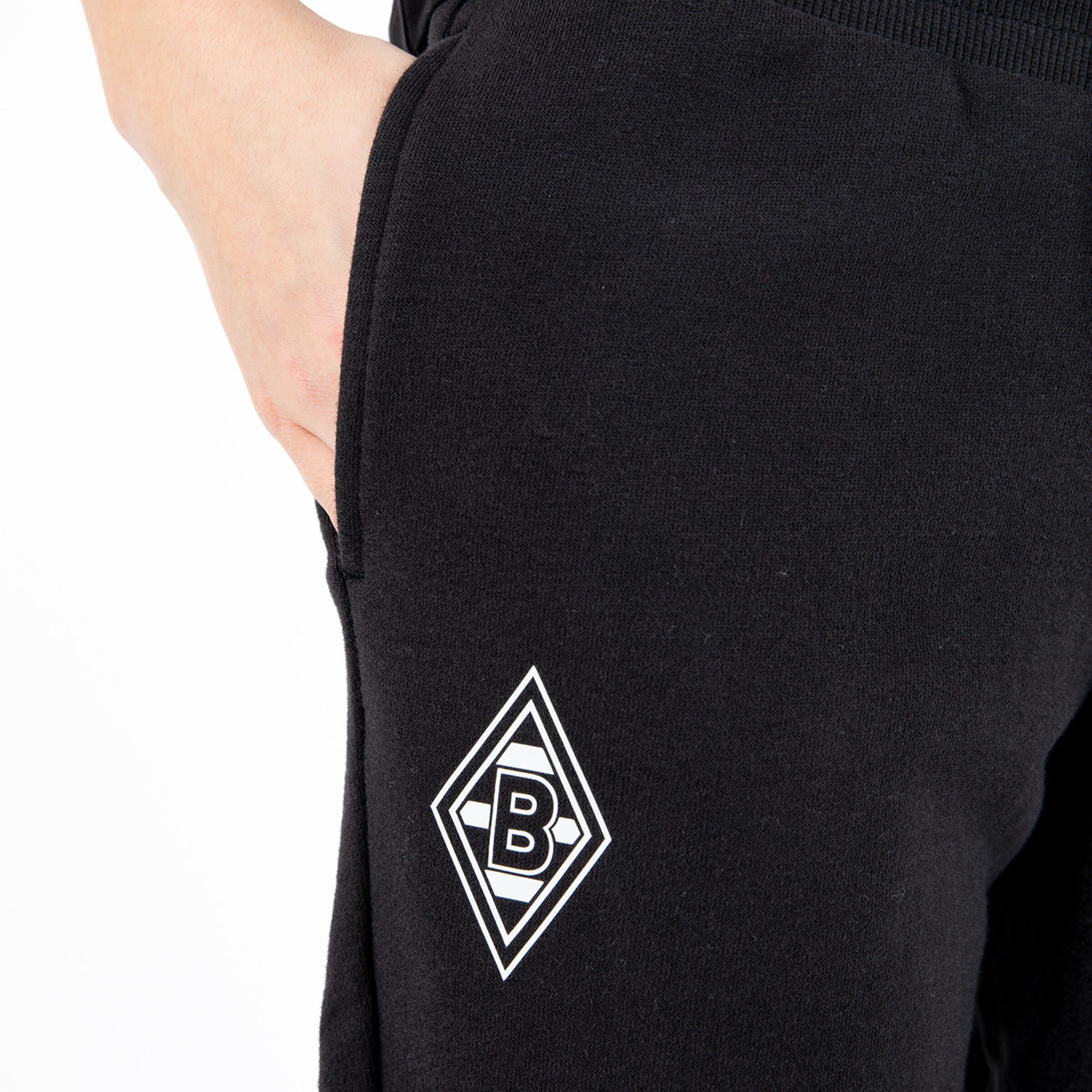 Black joggers featuring the Borussia Mönchengladbach logo.