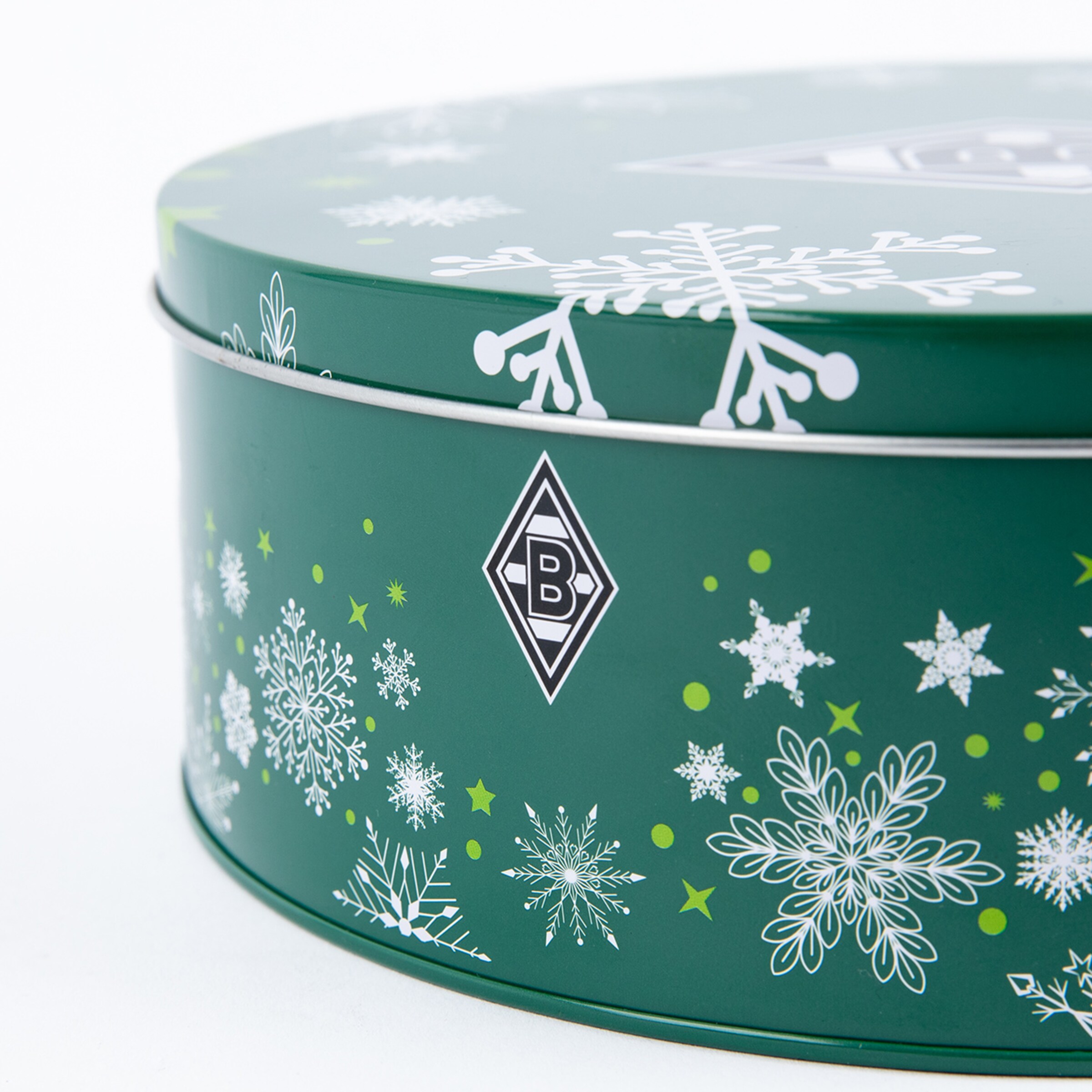 Runde grüne Blechdose mit Wintermotiven und Borussia Mönchengladbach-Logo.