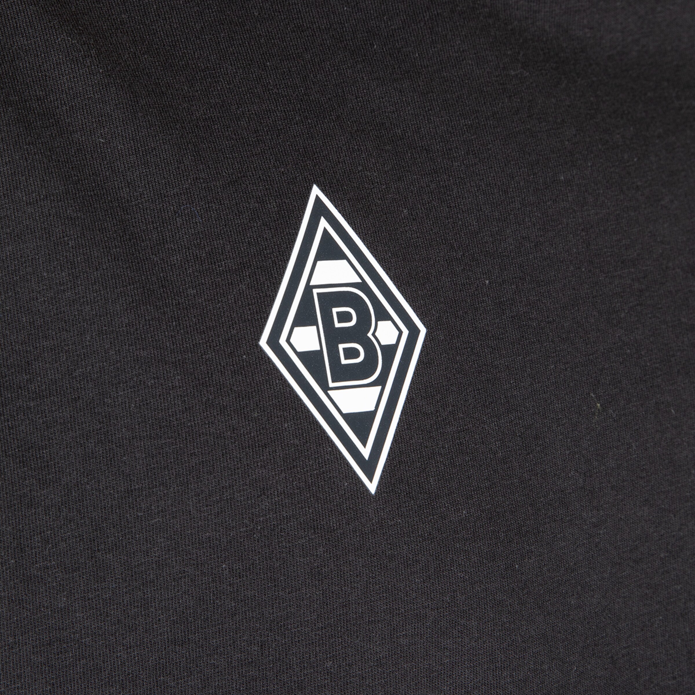 Borussia Mönchengladbach logo in black and white on a black background.
