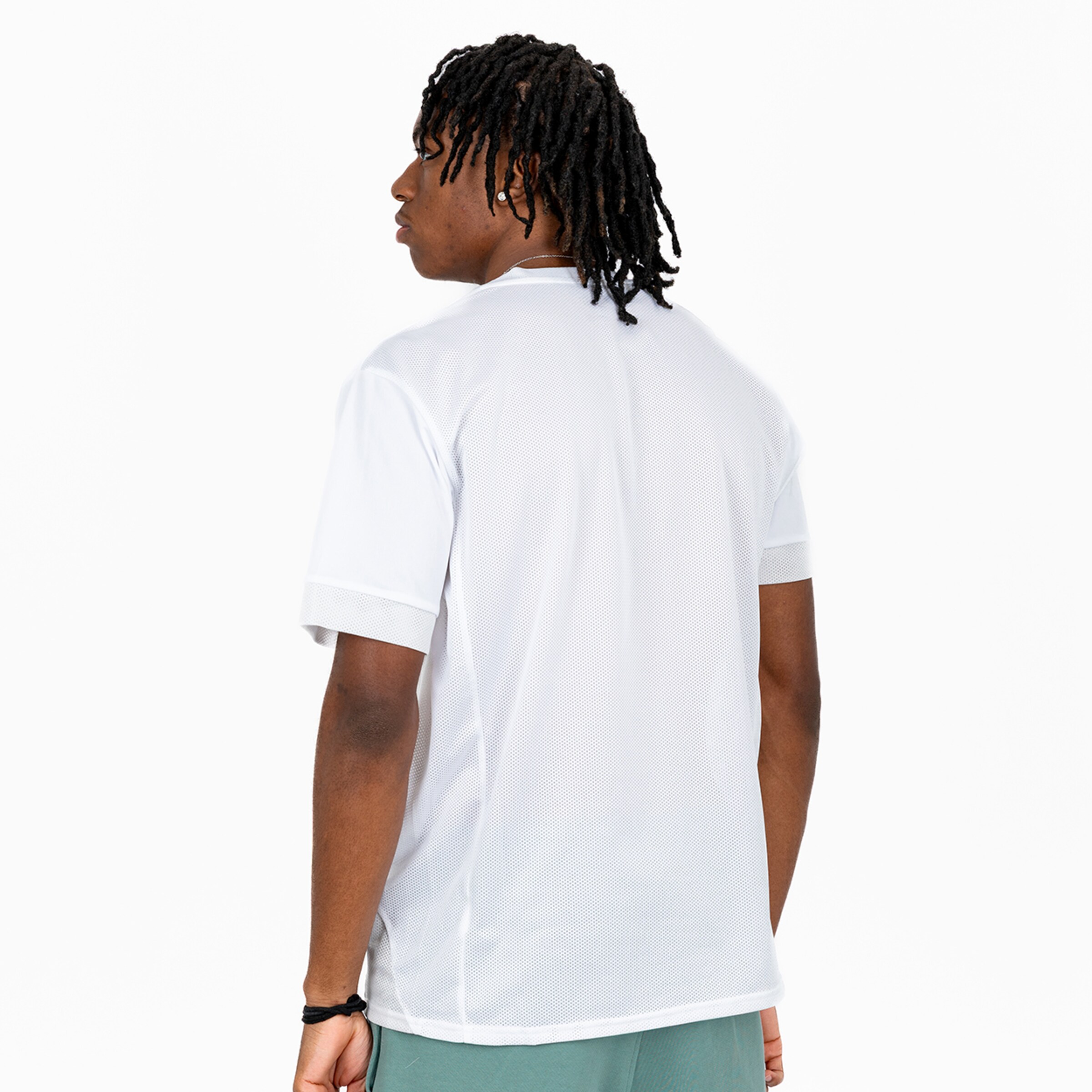 Man wearing a gray sports jersey from the back.