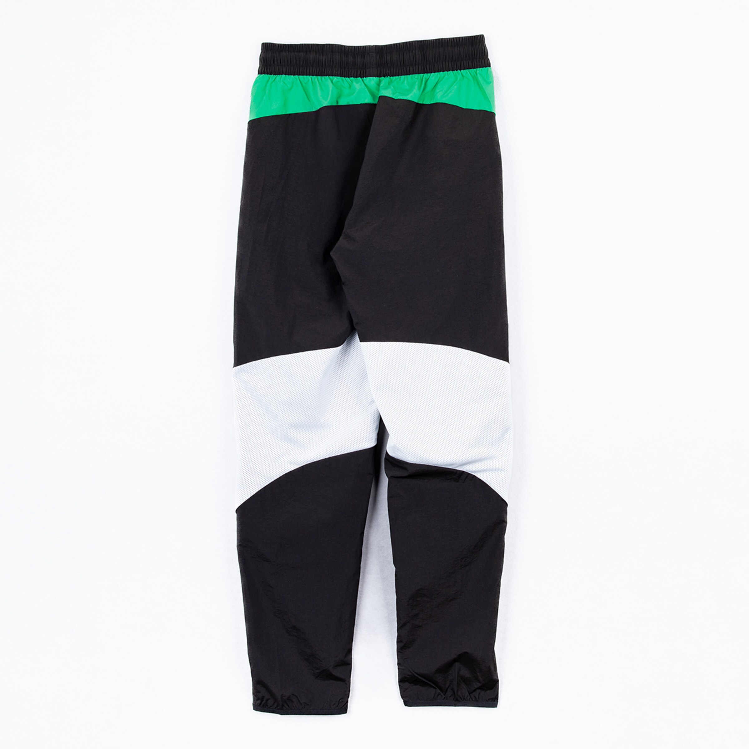 Schwarze Sporthose mit grauen und grünen Details.