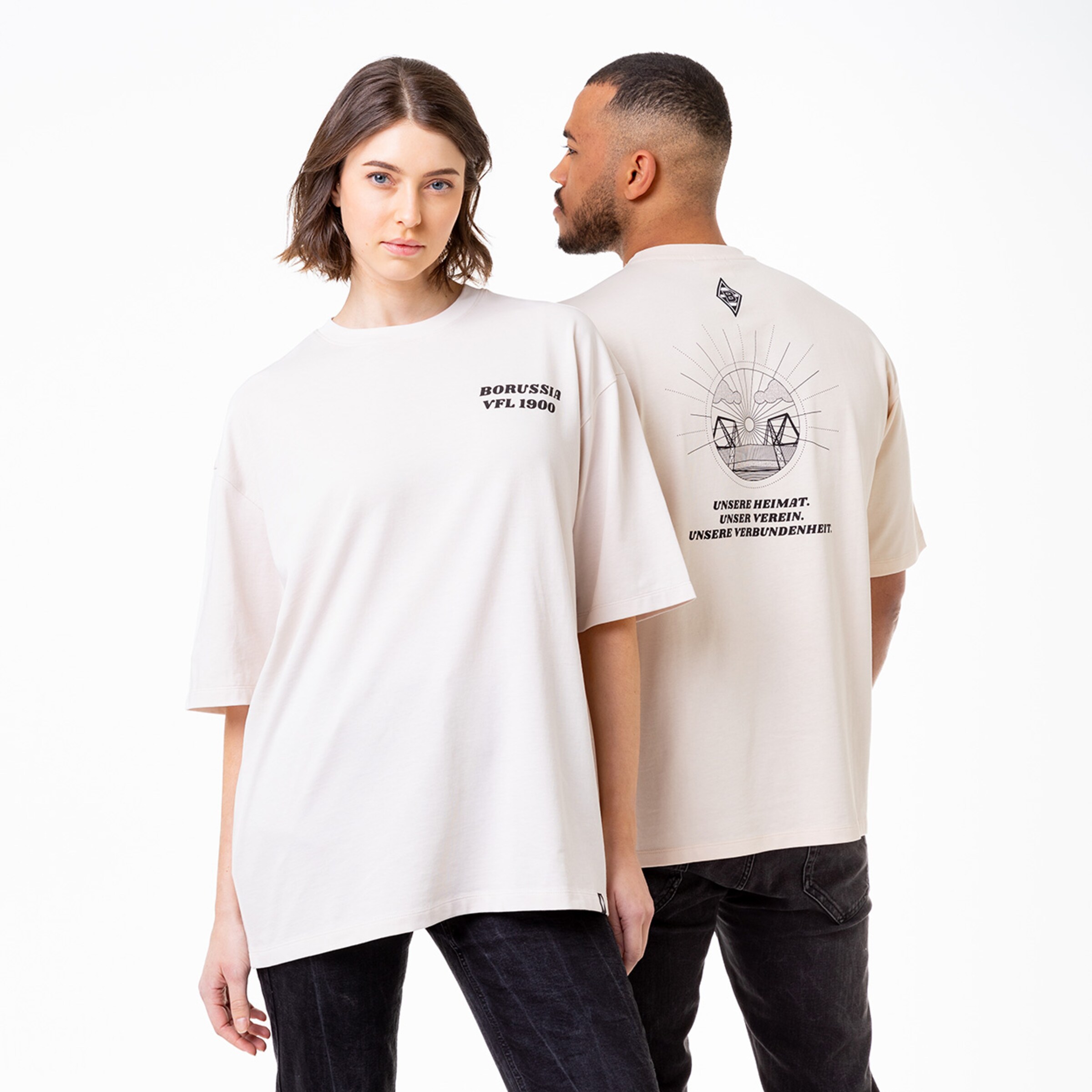 Trendy beige T-shirt featuring graphic design on the back.