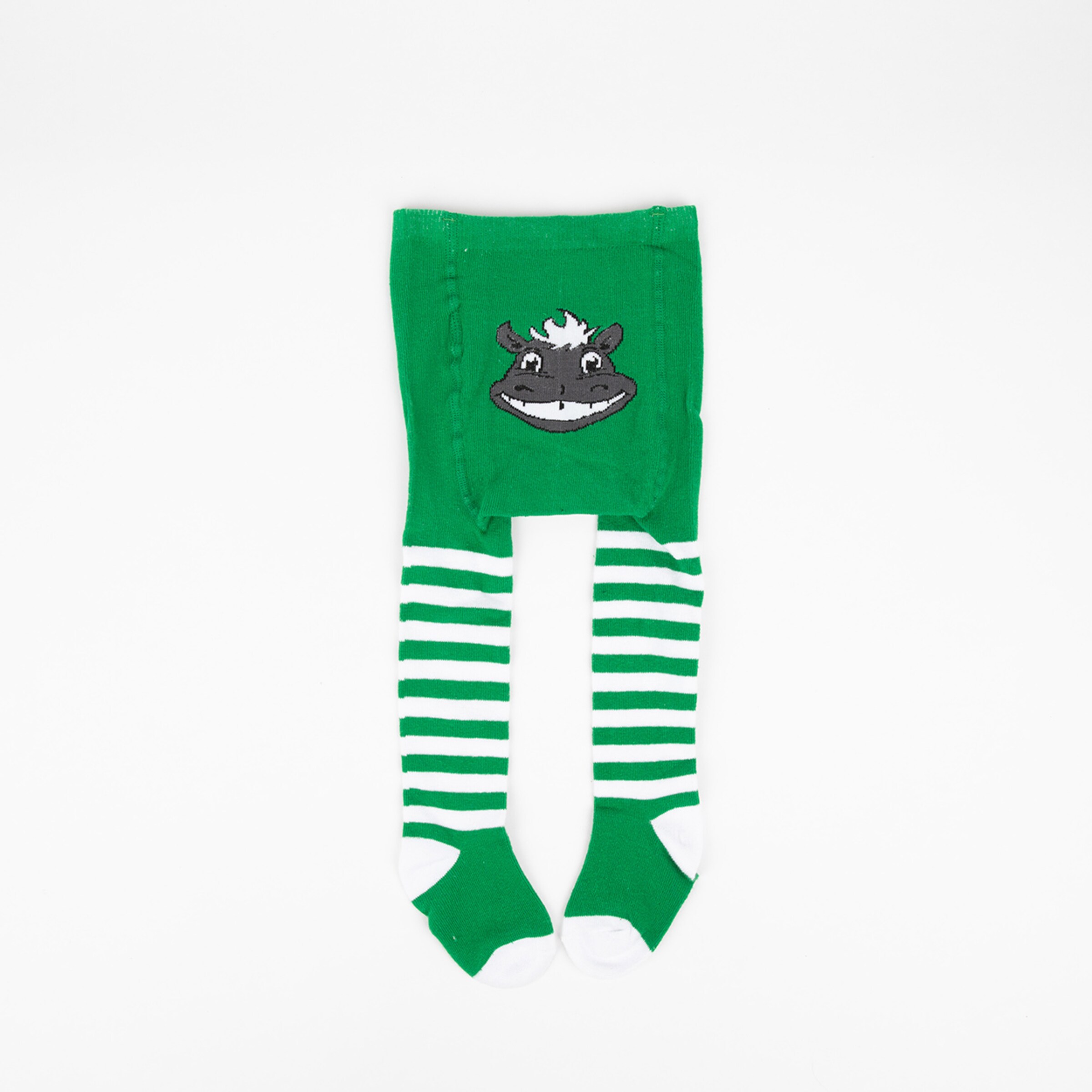 Green tights with striped legs and a smiling cow design.