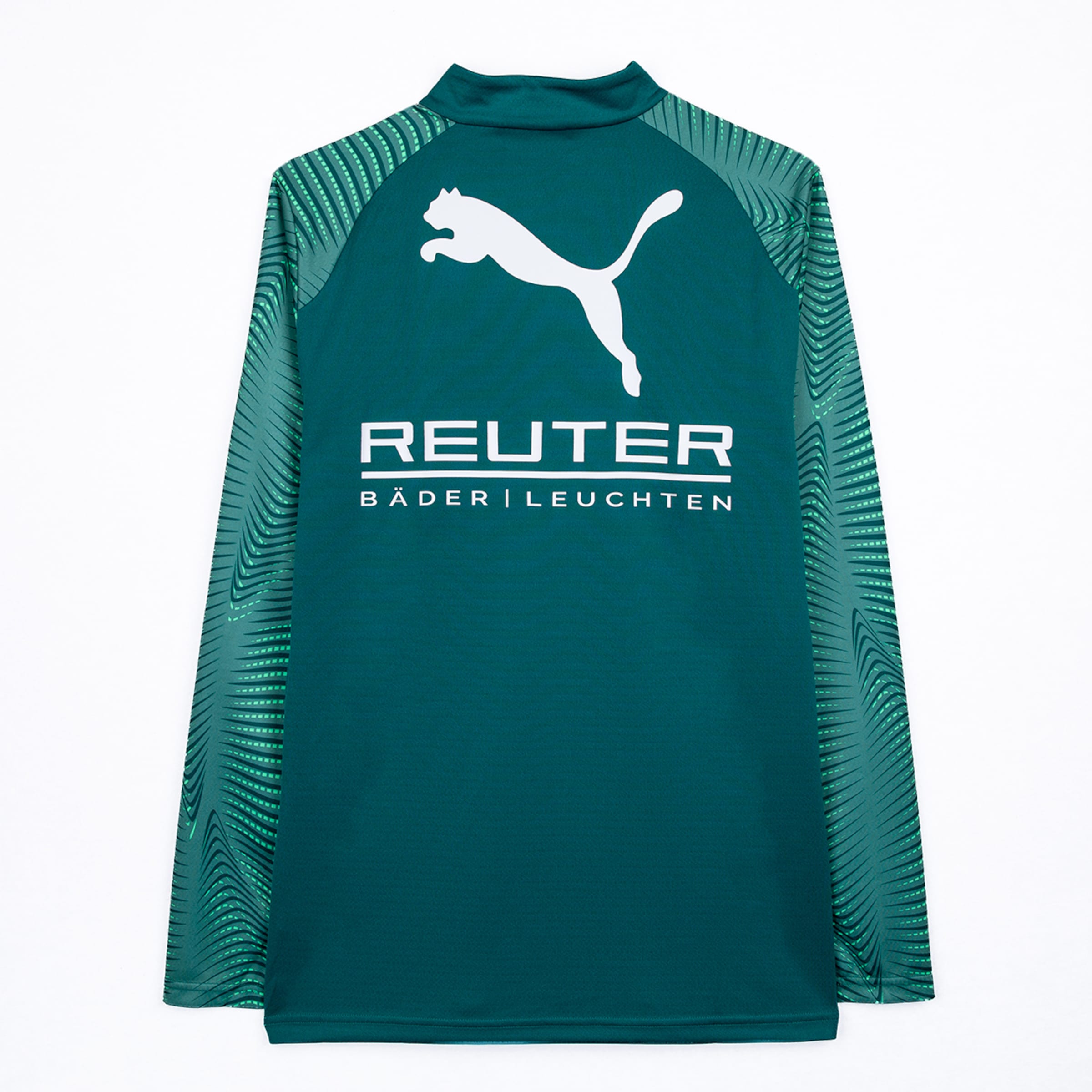 Back of a dark teal long-sleeved shirt with a white Puma logo and 'REUTER BÄDER | LEUCHTEN' text. The sleeves feature an abstract pattern of green lines and dashes.