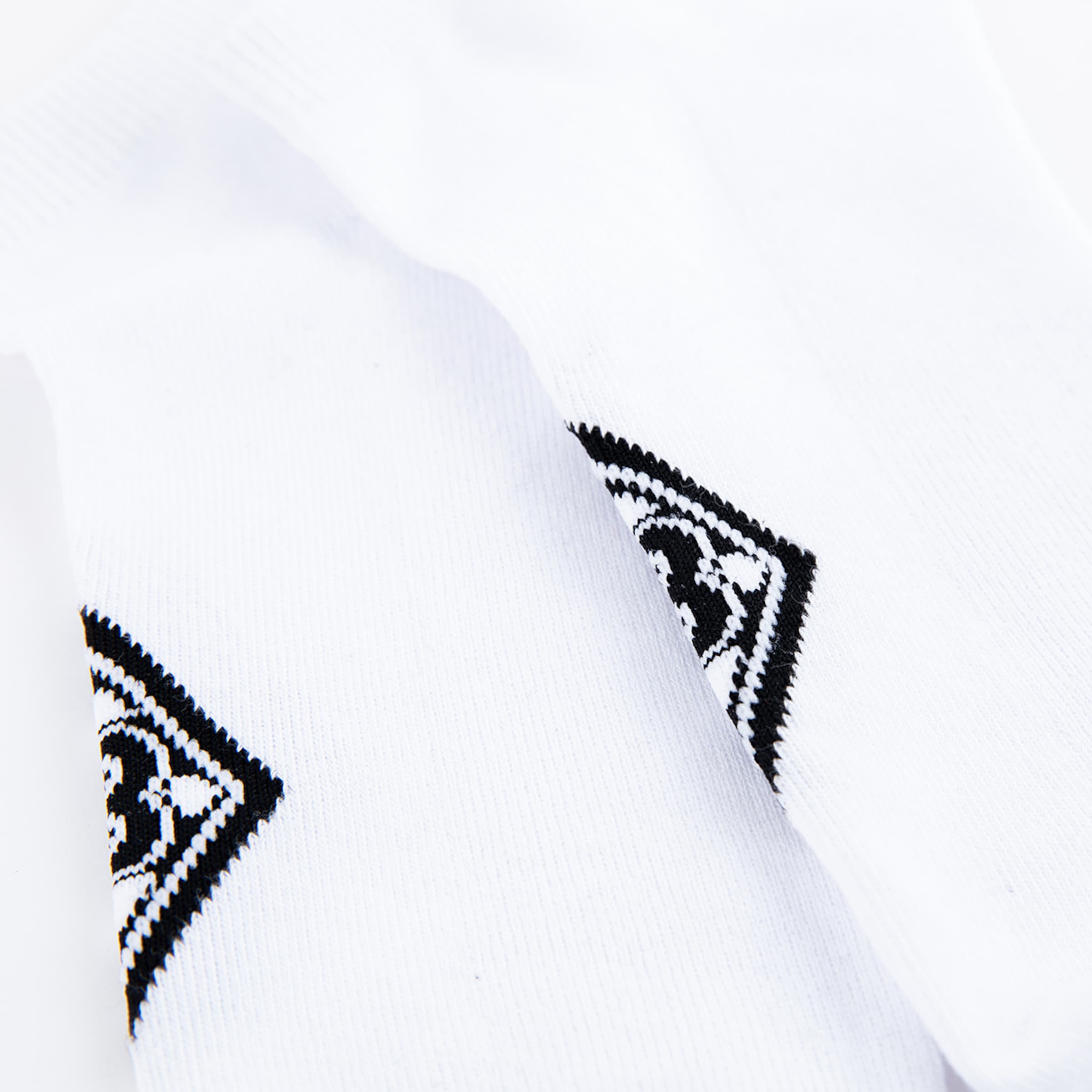 White socks featuring the Borussia Mönchengladbach logo in black.