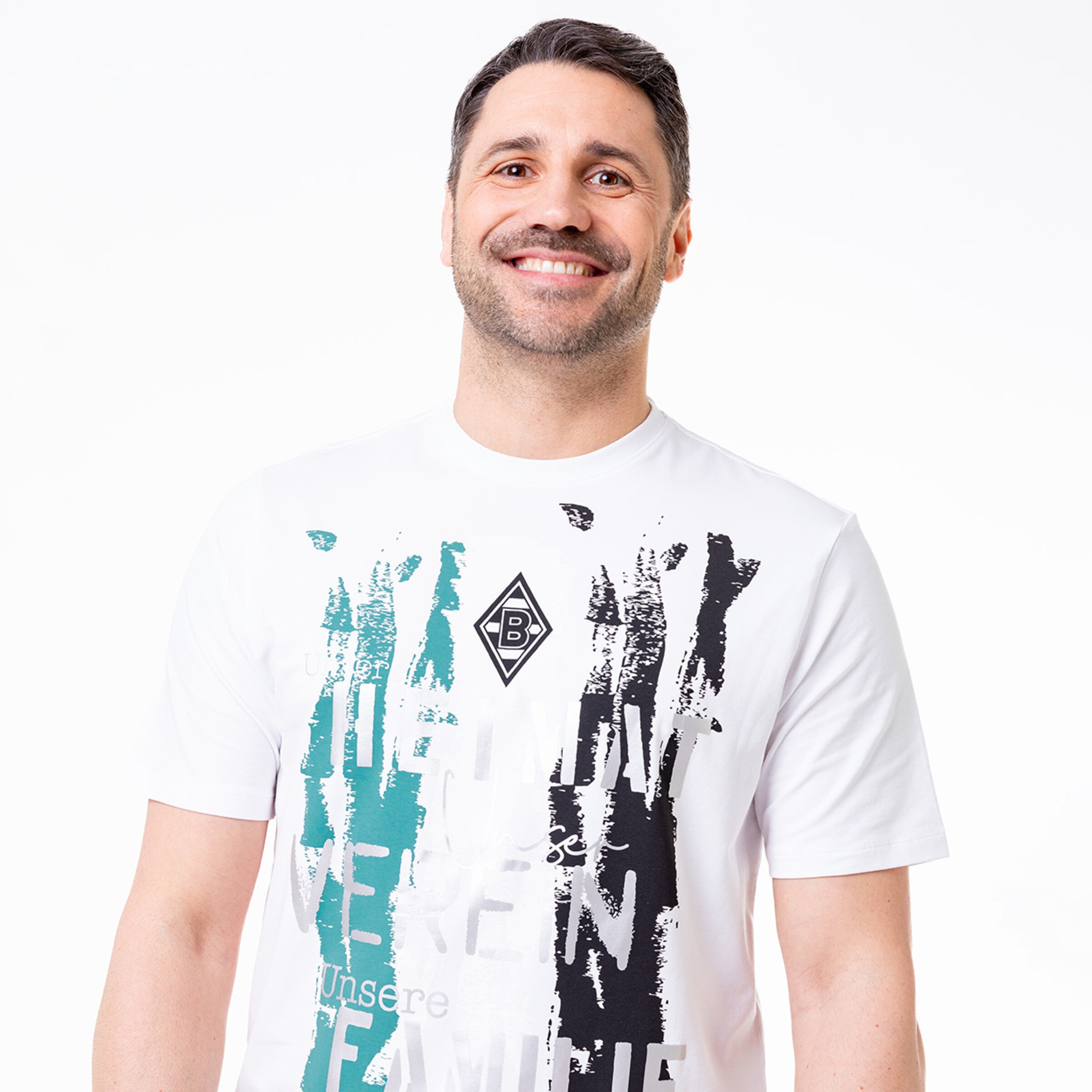 Mann trägt ein T-Shirt mit dem Aufdruck THE ONE und dem Borussia Mönchengladbach Logo.